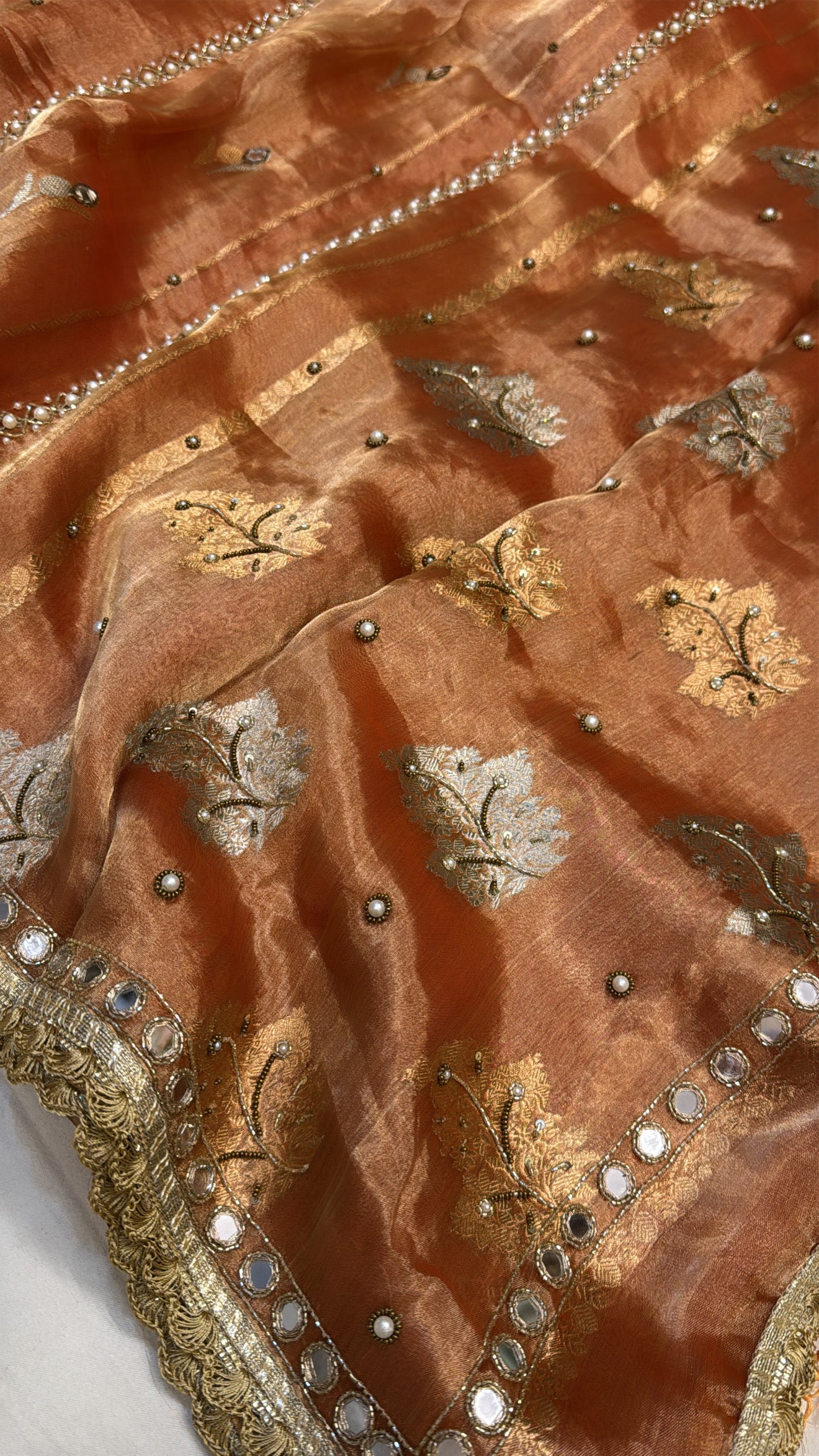 Burnt orange husn tissue silk hand embroidered kadhwa saree