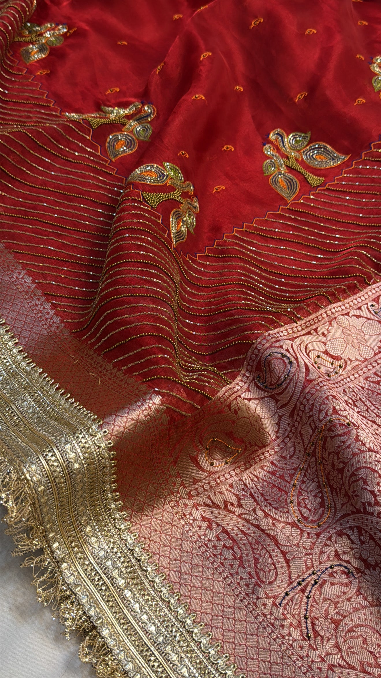 Dulhan ka joda husn red tissue silk hand embroidered saree