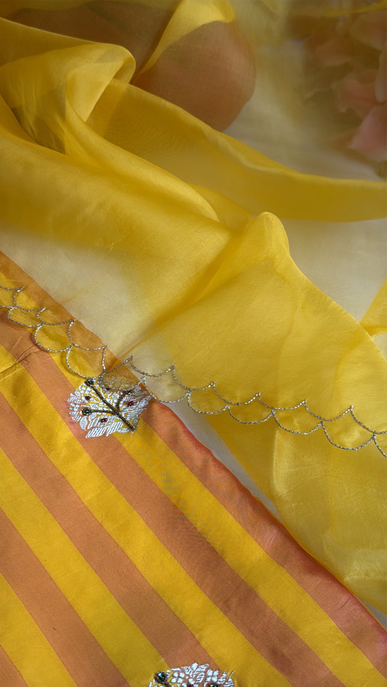 Haldi yellow-orange dhup chao effect katan silk striped kurta paired with kora silk scalloped duppata set