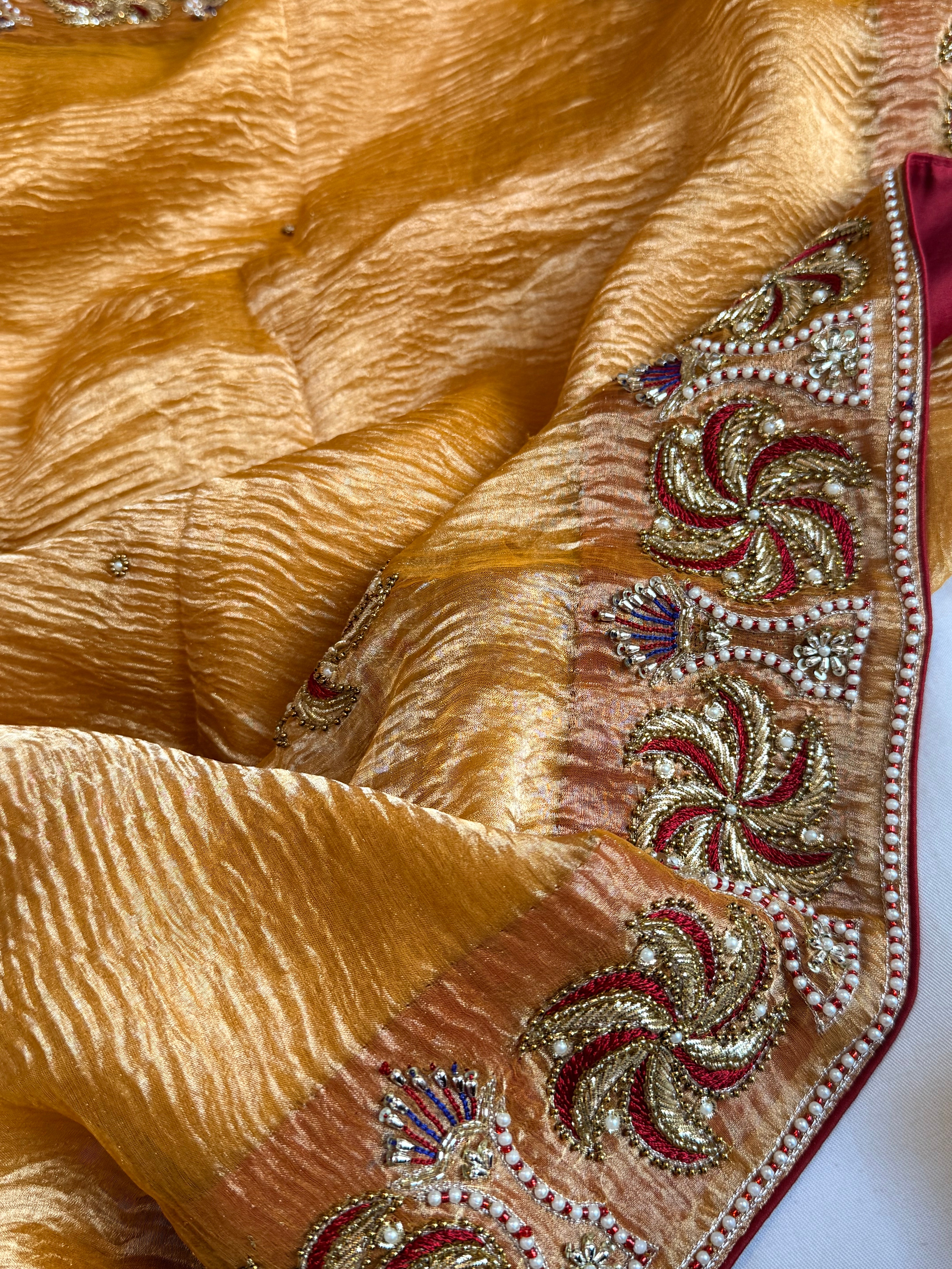 Rajkumari kesari yellow crushed tissue silk zardozi work hand embroidered saree