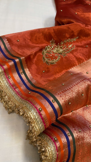 “Baarat wali saree” - Brick orange husn tissue silk hand embroidered saree