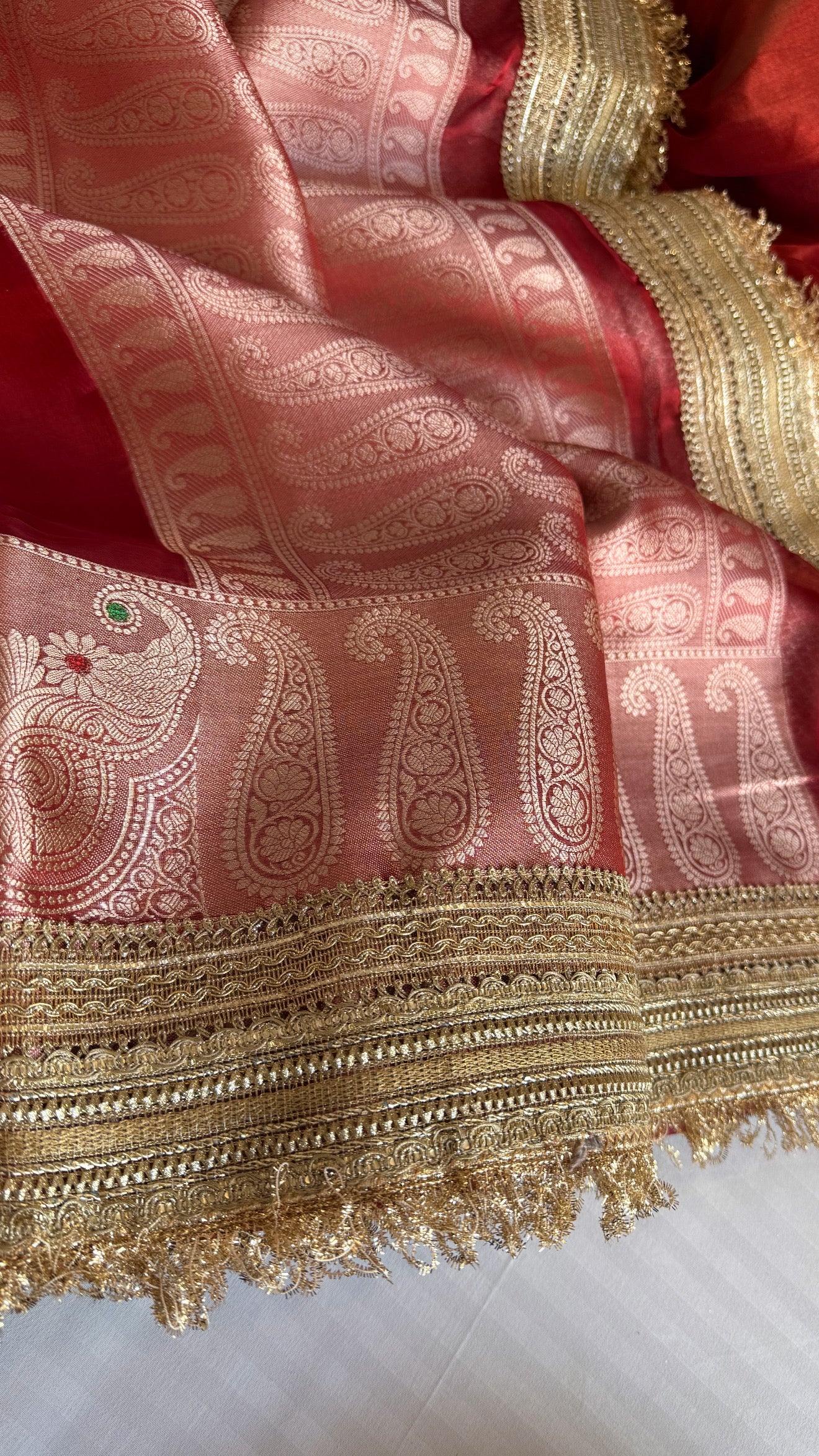 Viral maharani dhup chao red tissue silk meenakari border saree