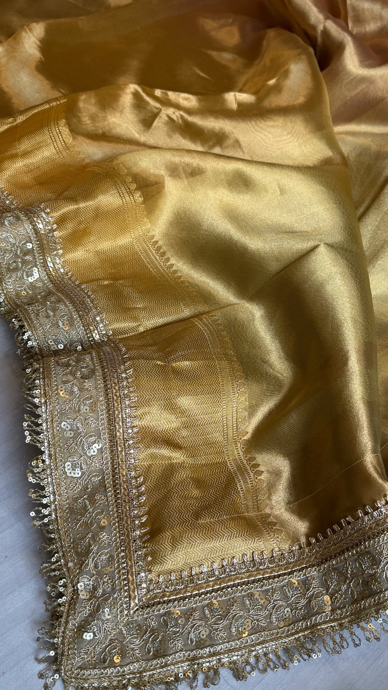 Earthy shades of rang birangi maharani tissue silk kadhwa saree