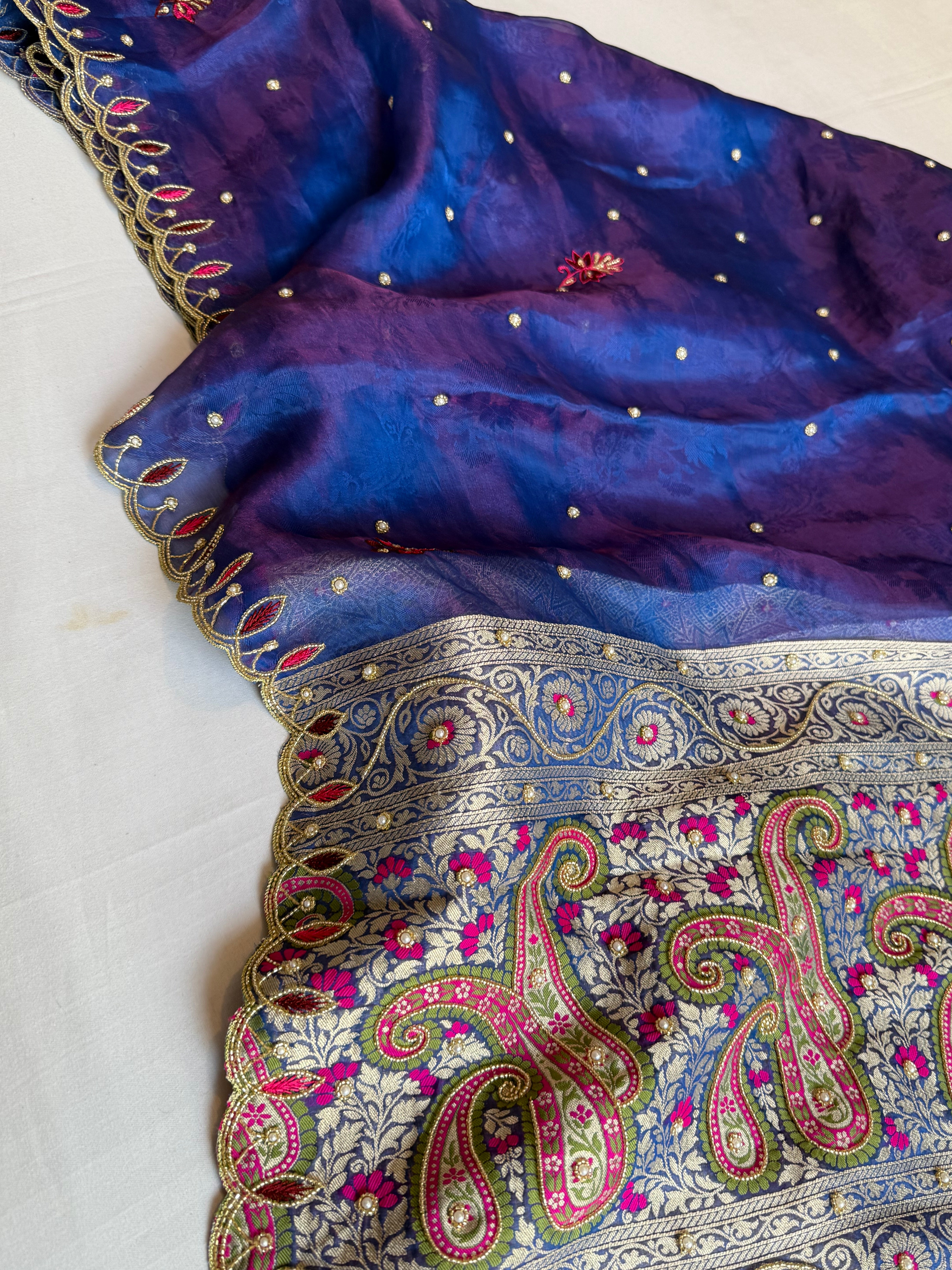 Electric midnight blue dhup chao effect meenakari tissue tanchoi jamevar pallu hand embroidered saree