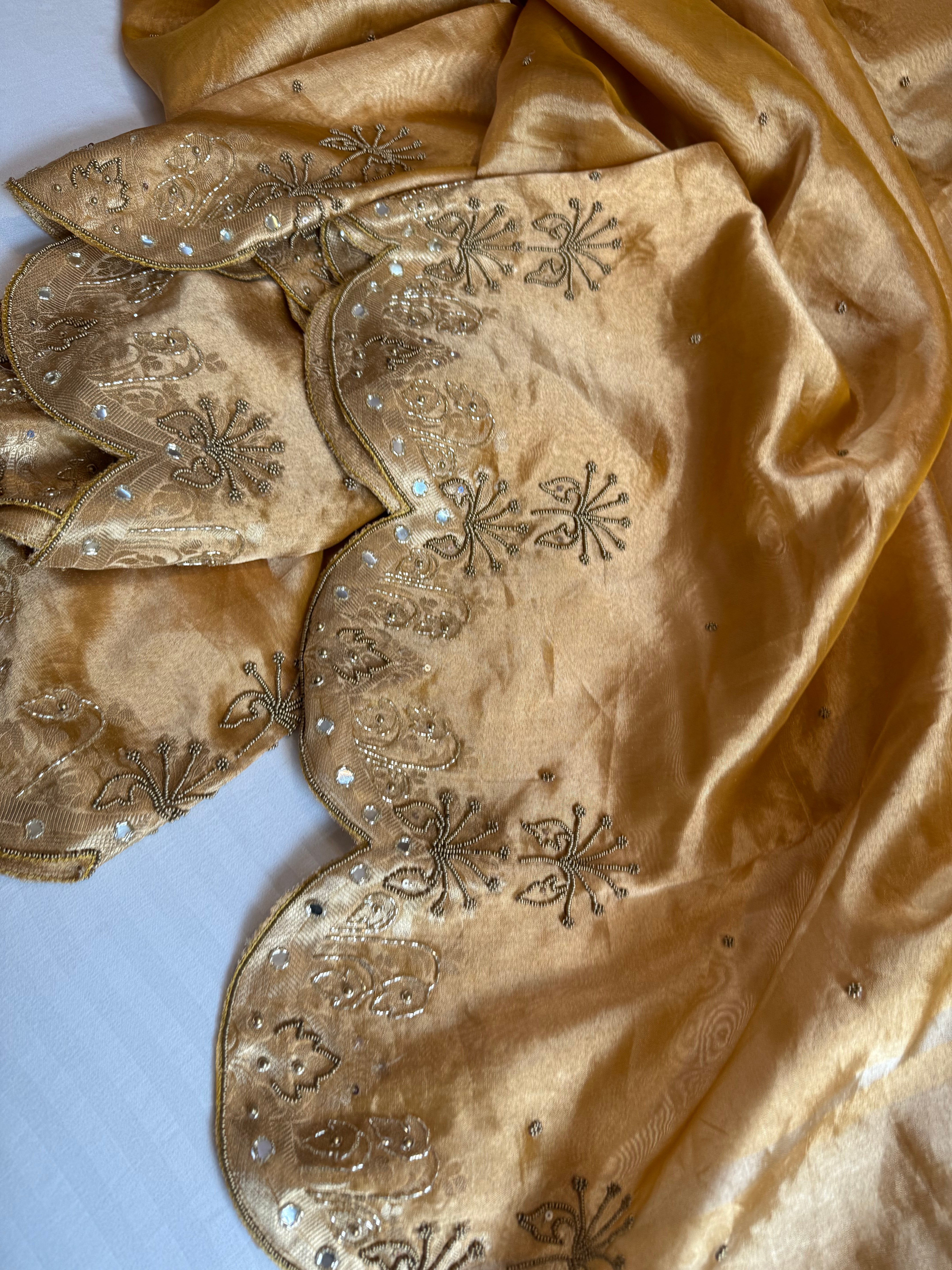 Husn kanjivaram gold tissue silk heavy hand embroidered saree