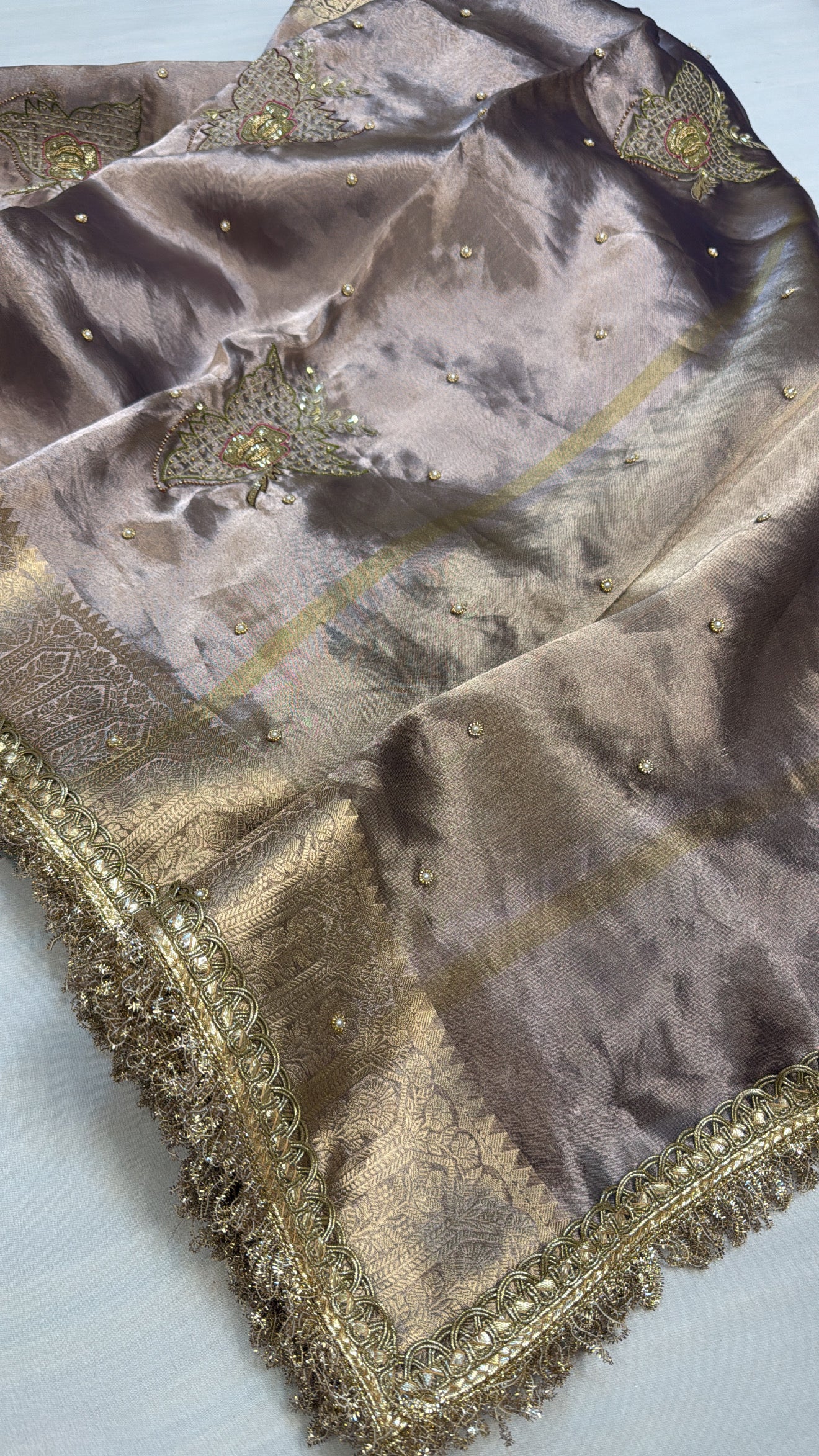 Husn ice silver tissue silk hand embroidered saree