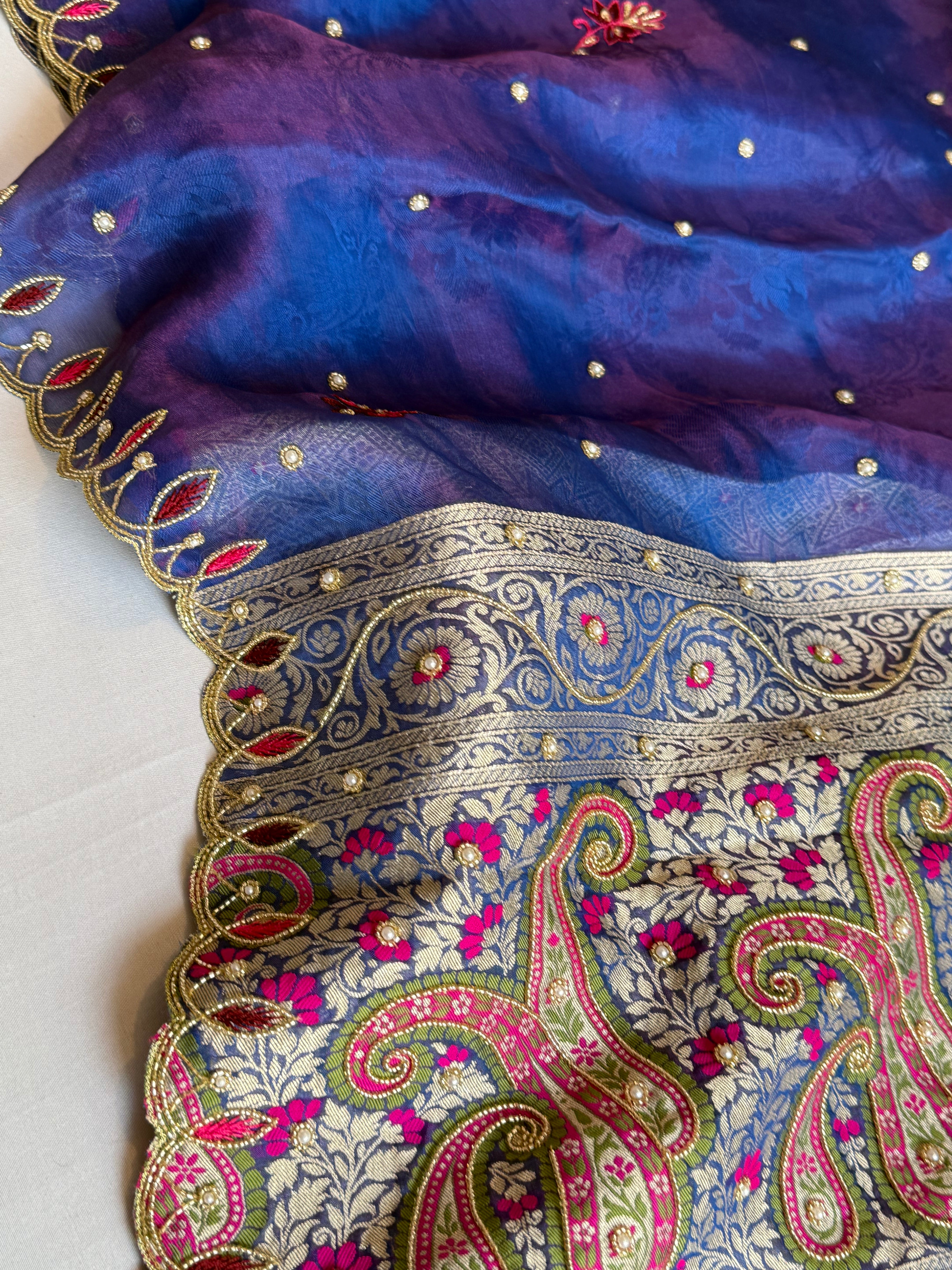 Electric midnight blue dhup chao effect meenakari tissue tanchoi jamevar pallu hand embroidered saree