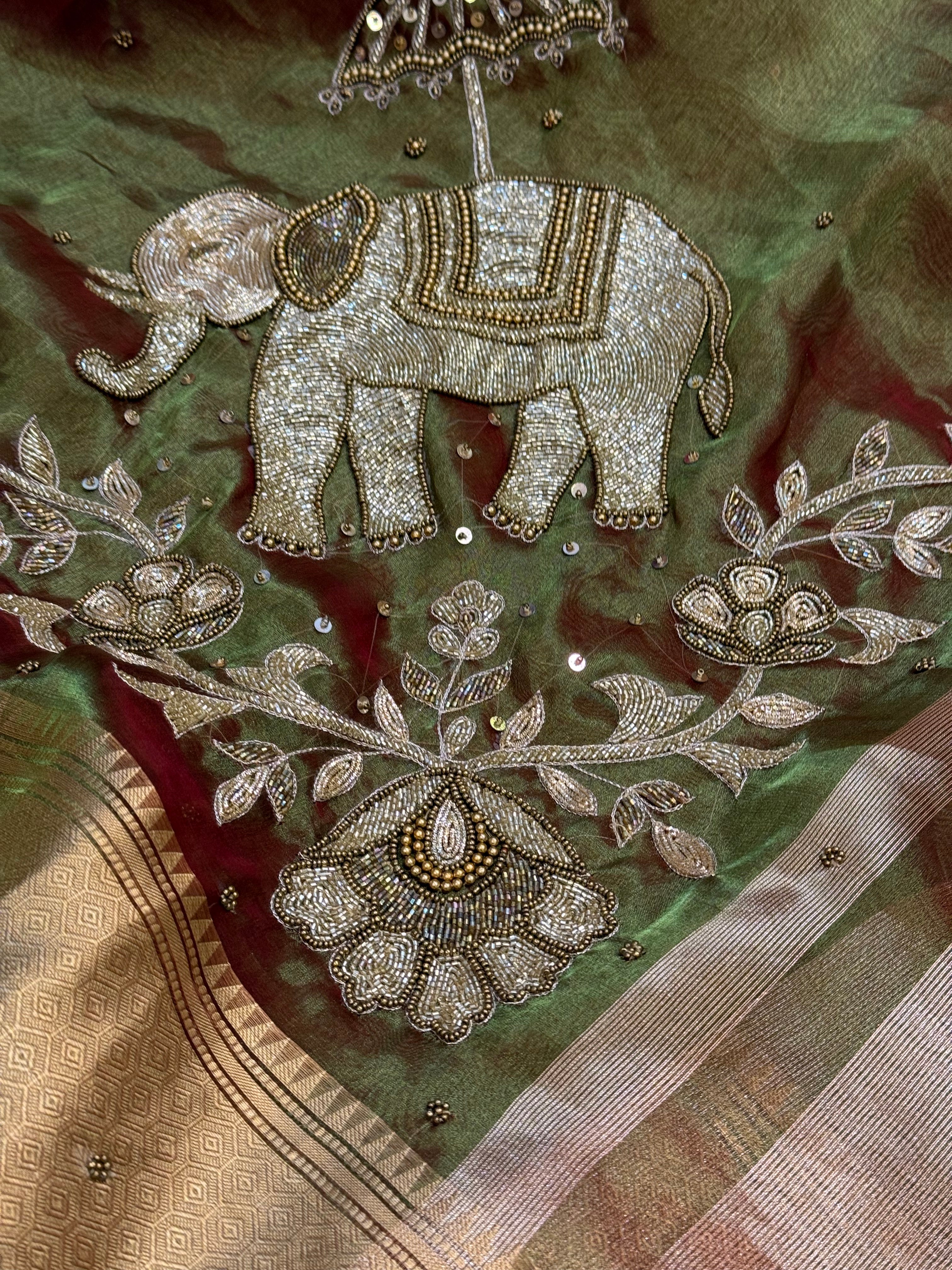 Dulhan ki maa wali sarees - Mehendi green elephant motif hand embroidered tissue saree