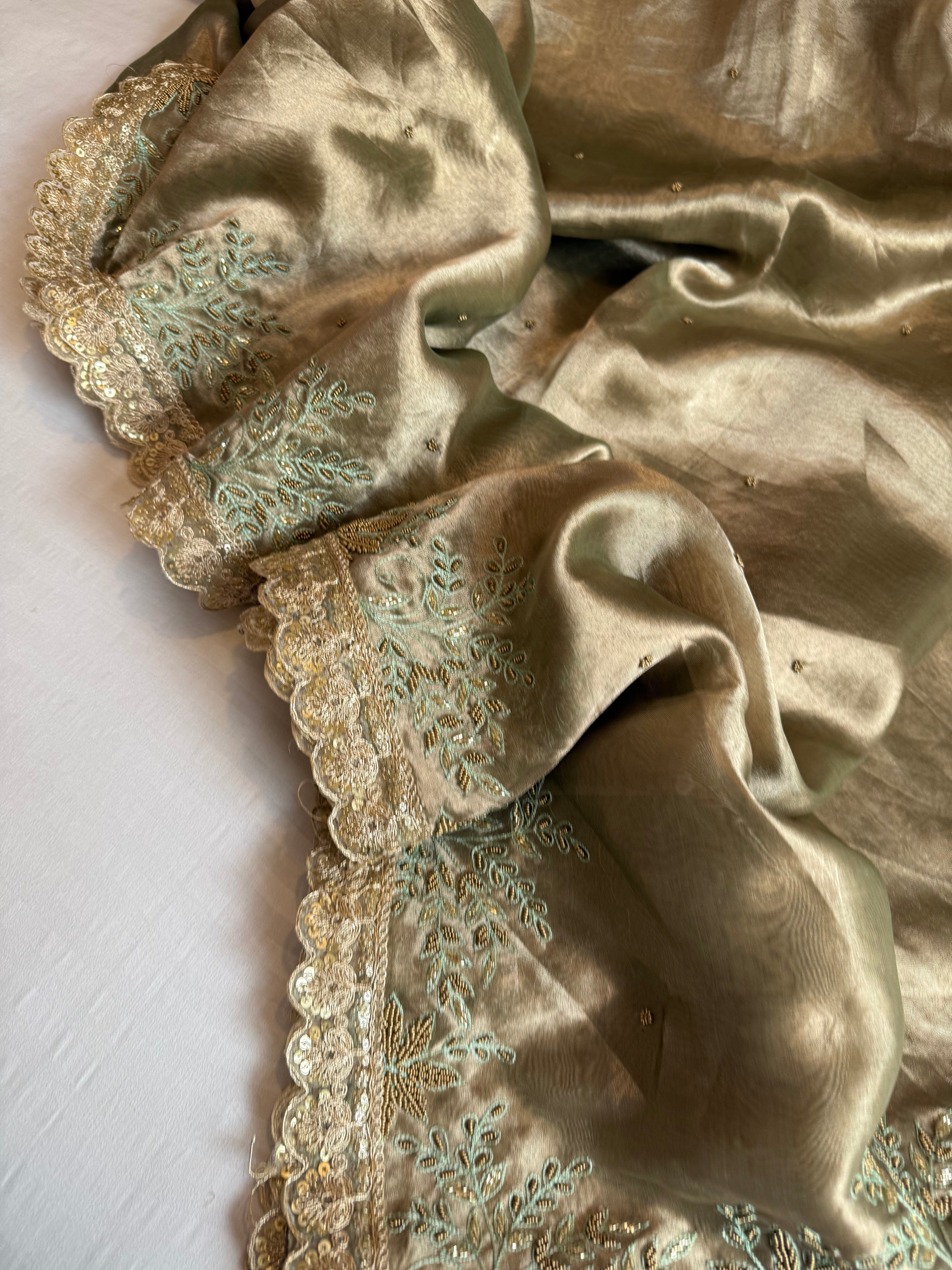 Husn tissue silk sage green heavy zardozi hand embroidered saree