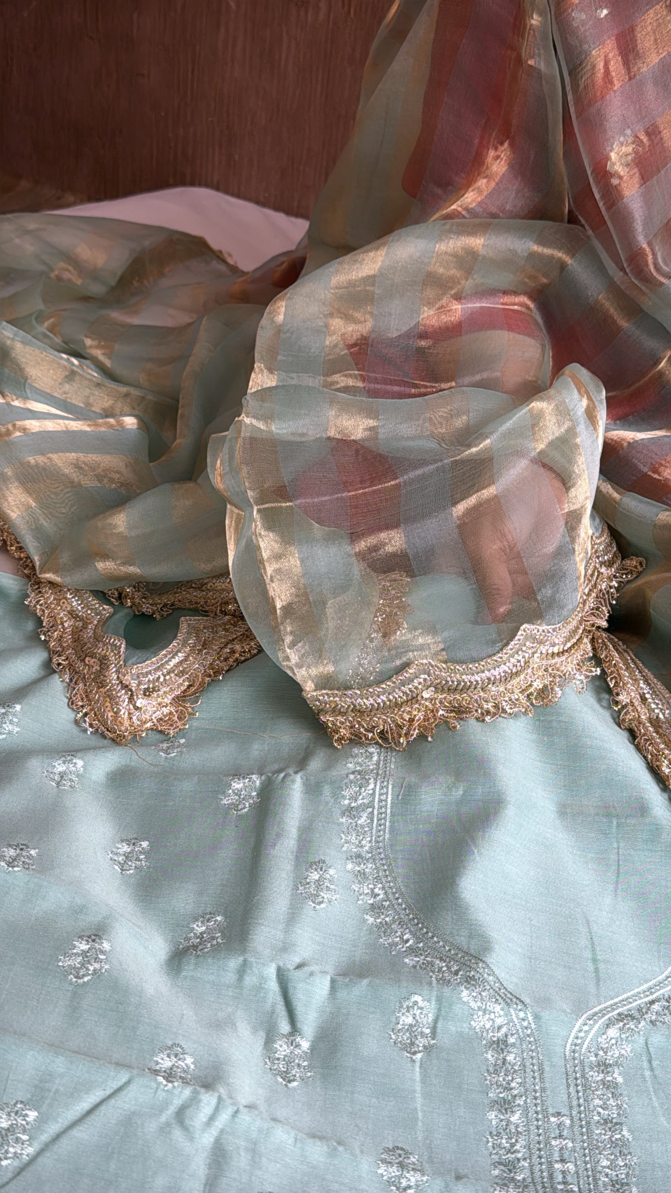 Banarasi cotton silk hand embroidered kurta paired with kora tissue striped duppata set