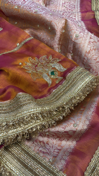 Husn pinkish-orange dhup chao effect tissue silk hand embroidered saree