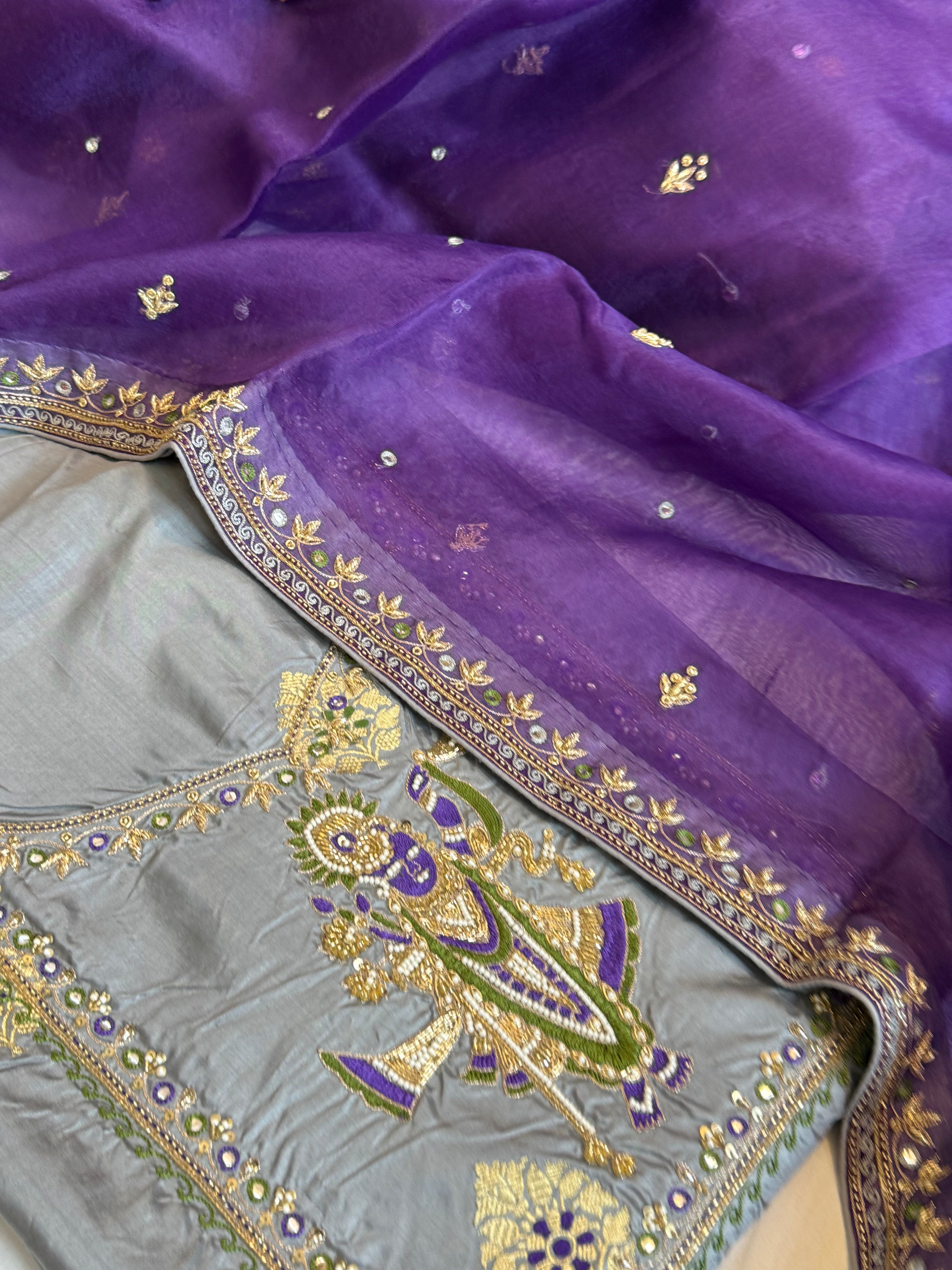 Lavender- grey shade katan silk “shrinathji” motif inspired katan silk hand embroidered suit set