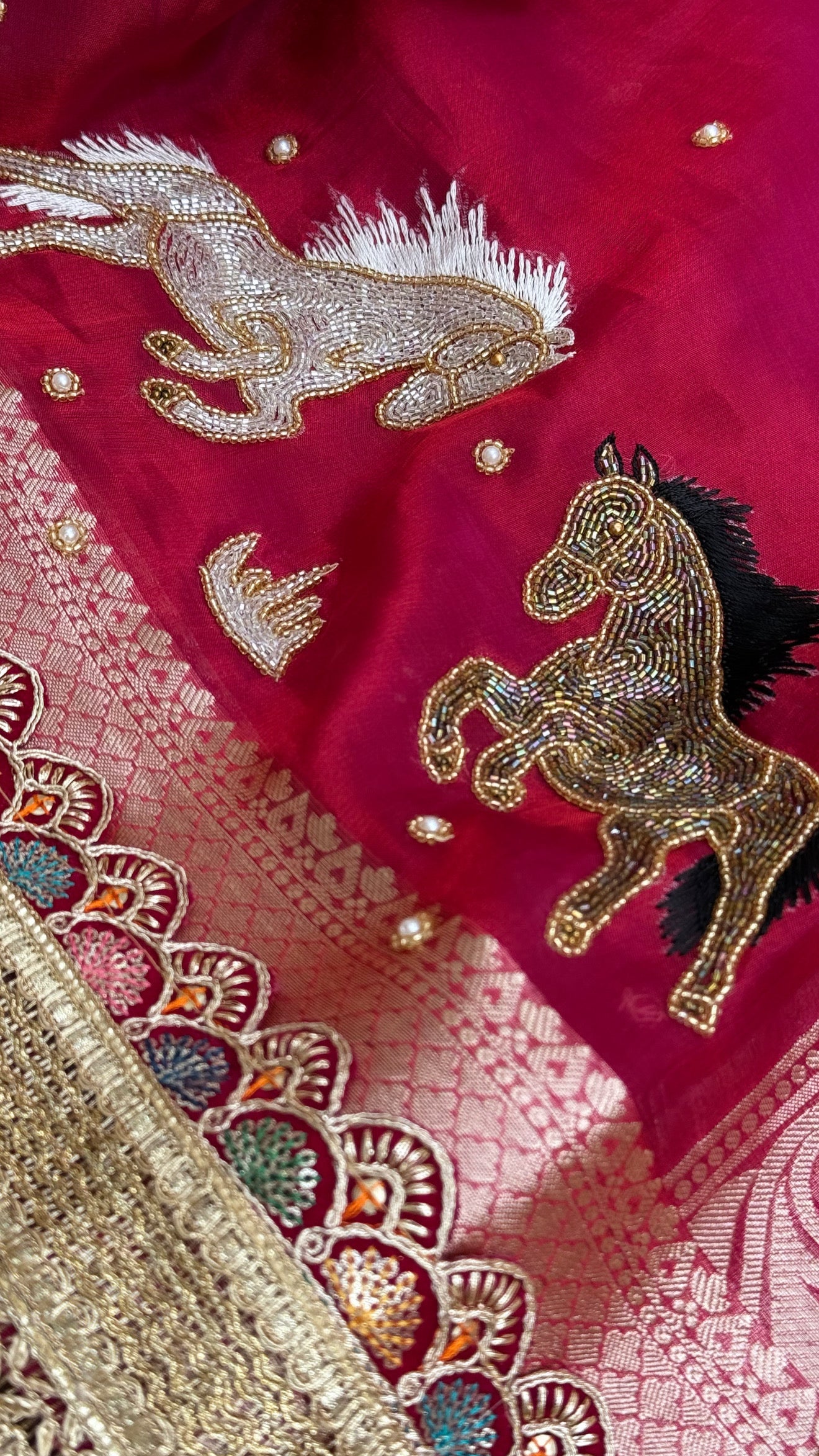 Horse hand embroidered motif cherry pinkish red dhup chao effect tissue silk banarasi gotapatti kadhwa saree