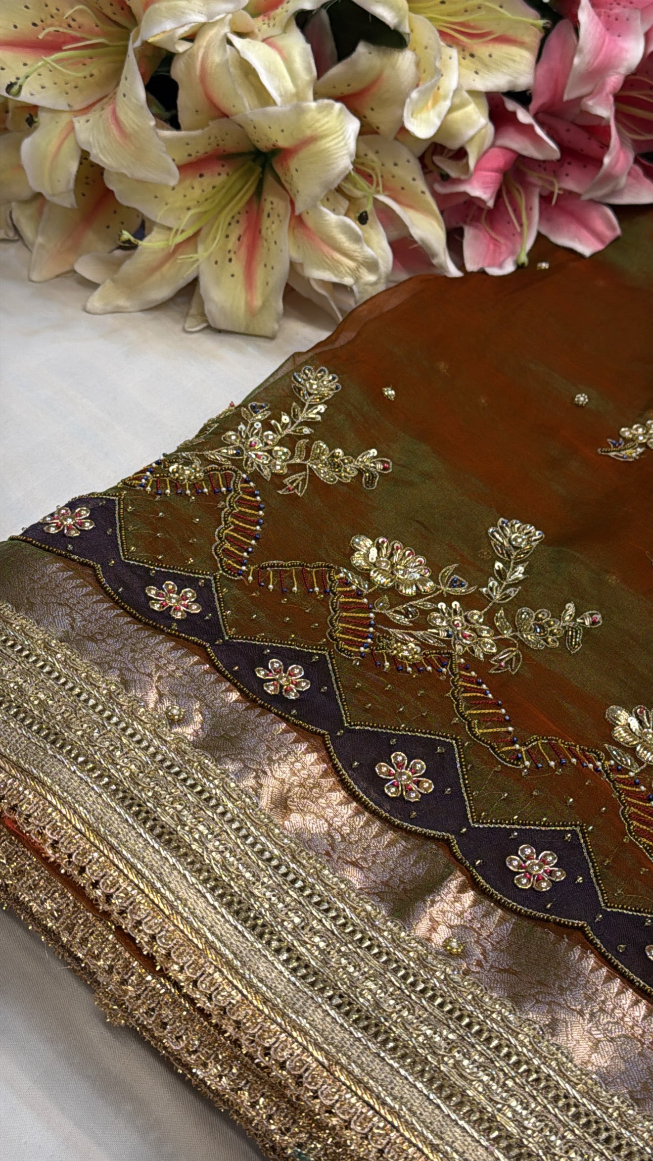 Mehendi green dhup chao effect tissue silk hand embroidered saree