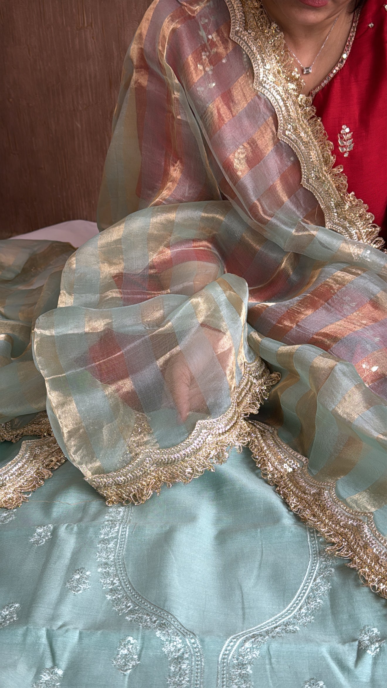 Banarasi cotton silk hand embroidered kurta paired with kora tissue striped duppata set