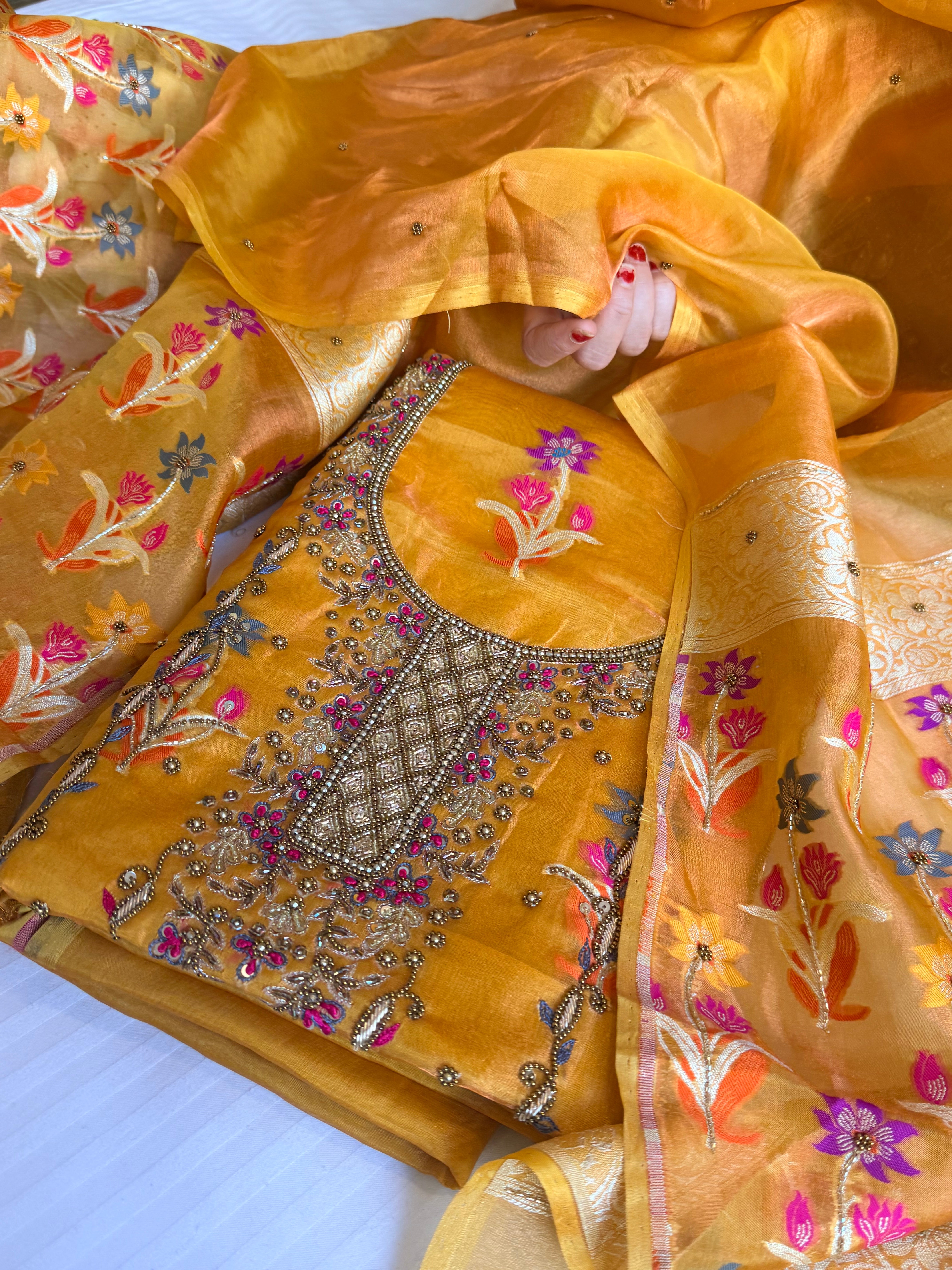 Banarasi tissue silk haldi gold tissue silk meenakari hand embroidered suit set