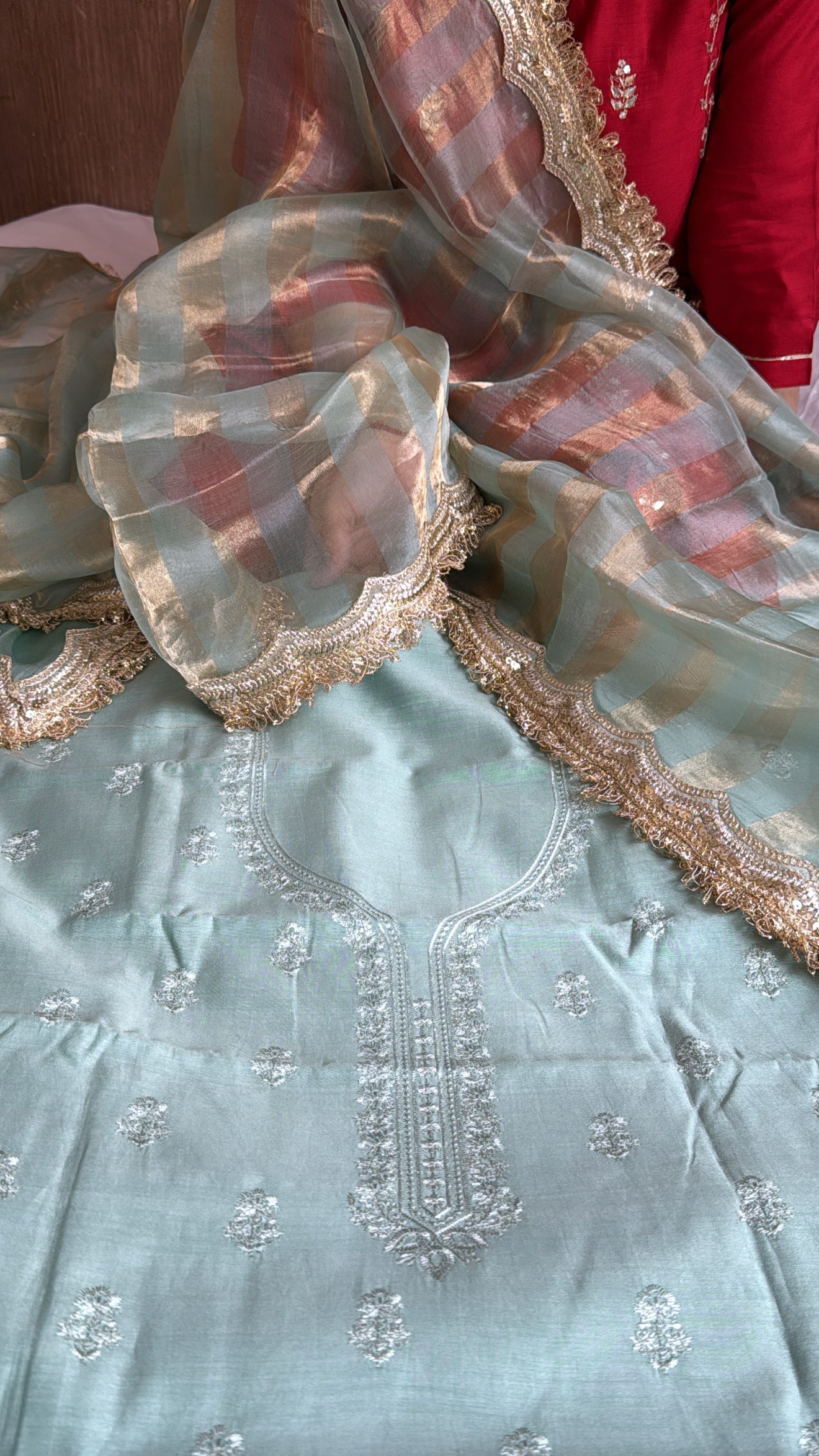 Banarasi cotton silk hand embroidered kurta paired with kora tissue striped duppata set