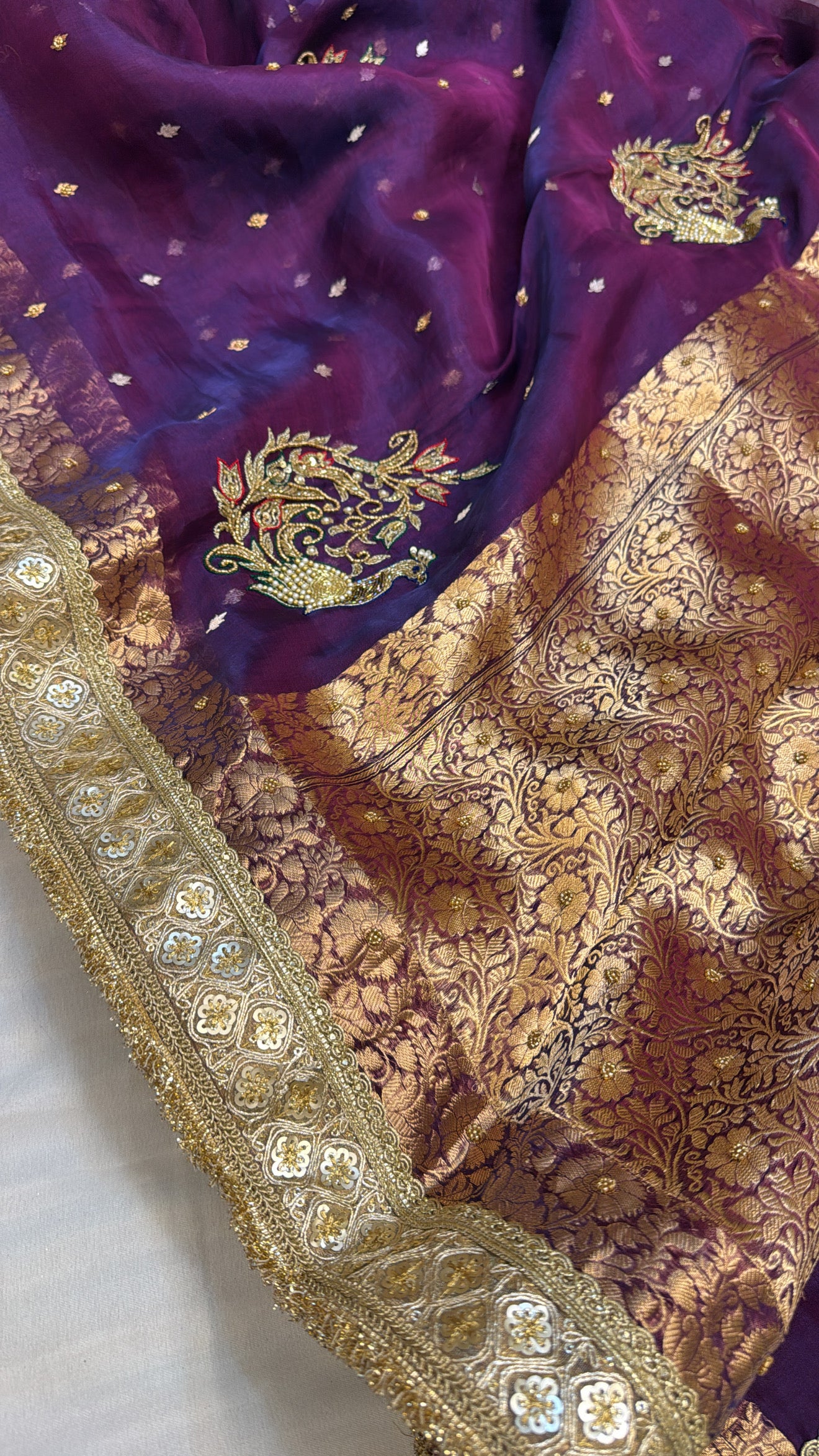 Husn peacock blue-purple dhup chao effect tissue silk hand embroidered saree