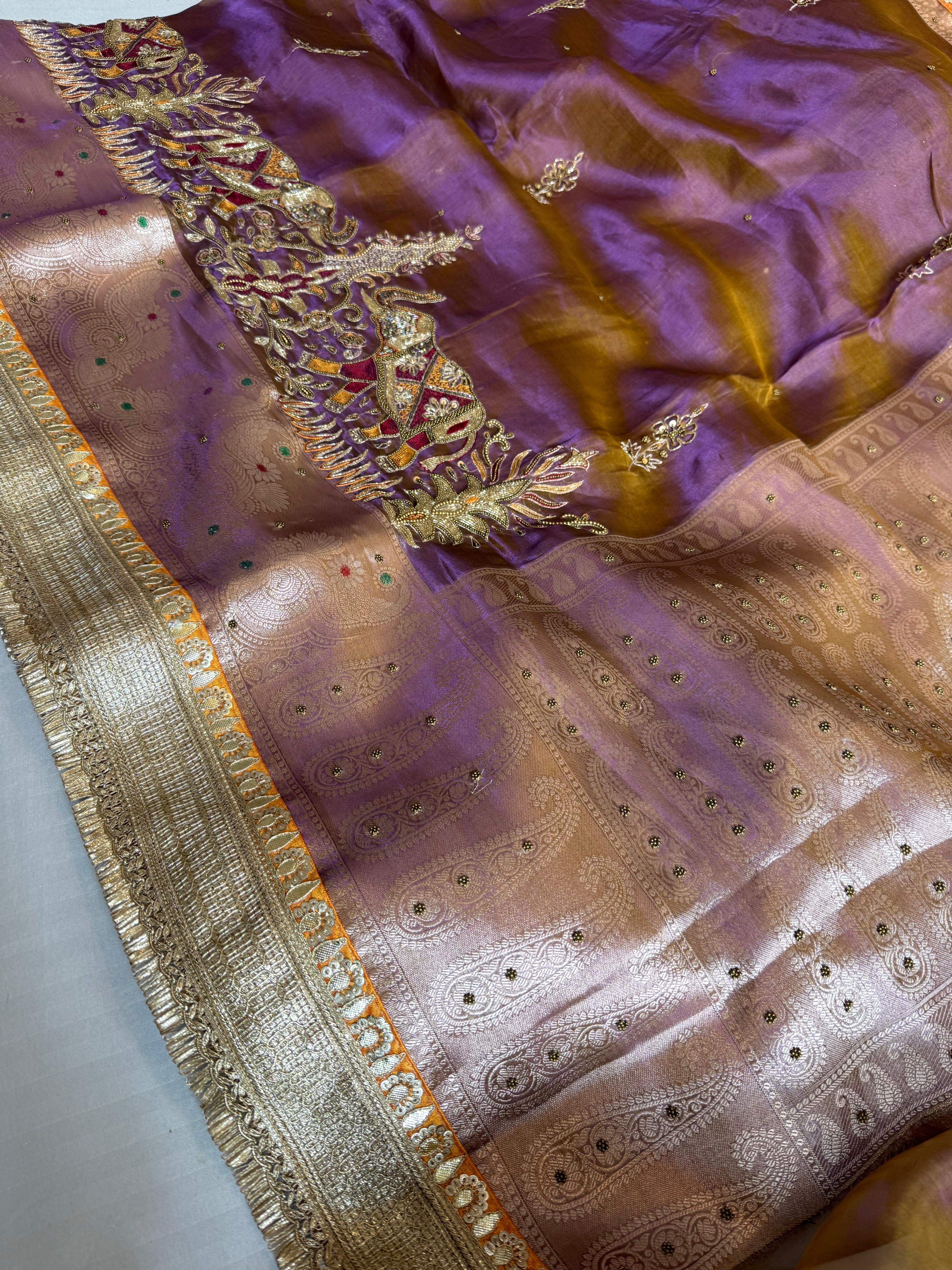 Elephant motif lavender tissue silk hand embroidered kadhwa saree
