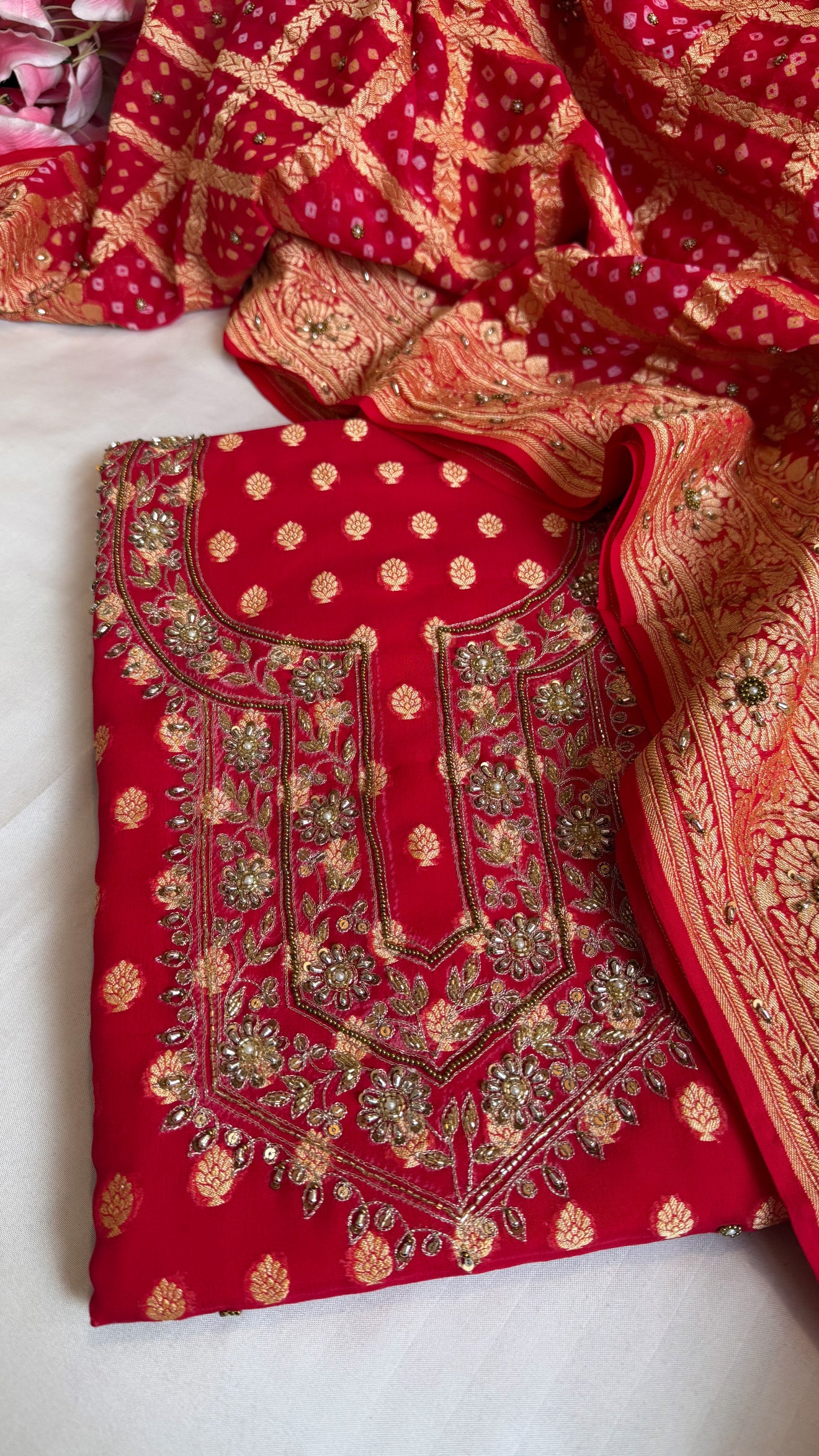 Red rai bandhej kadhwa gorgette hand embroidered suit set
