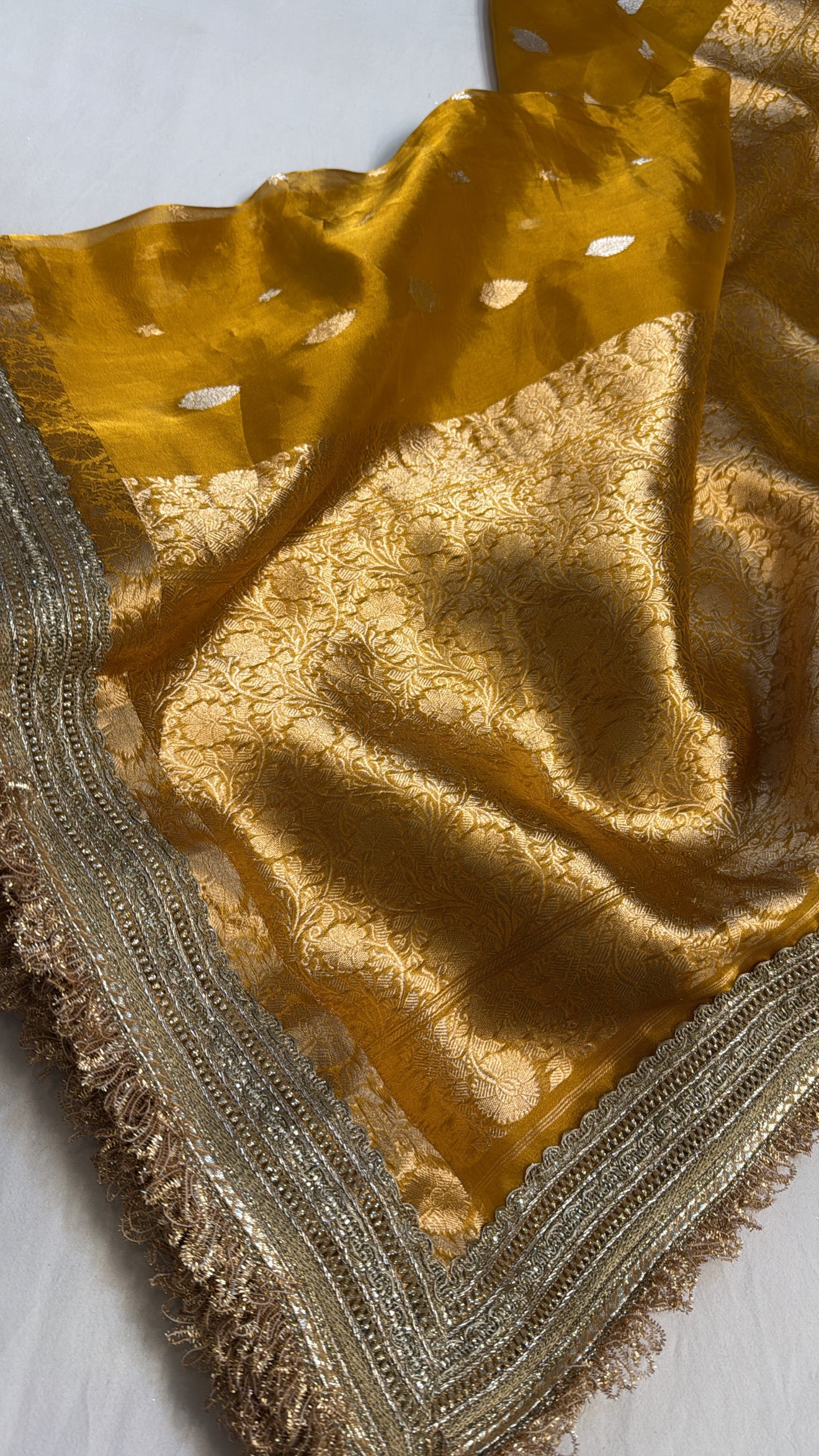 Maharani deep haldi yellow tissue silk kadhwa buti saree