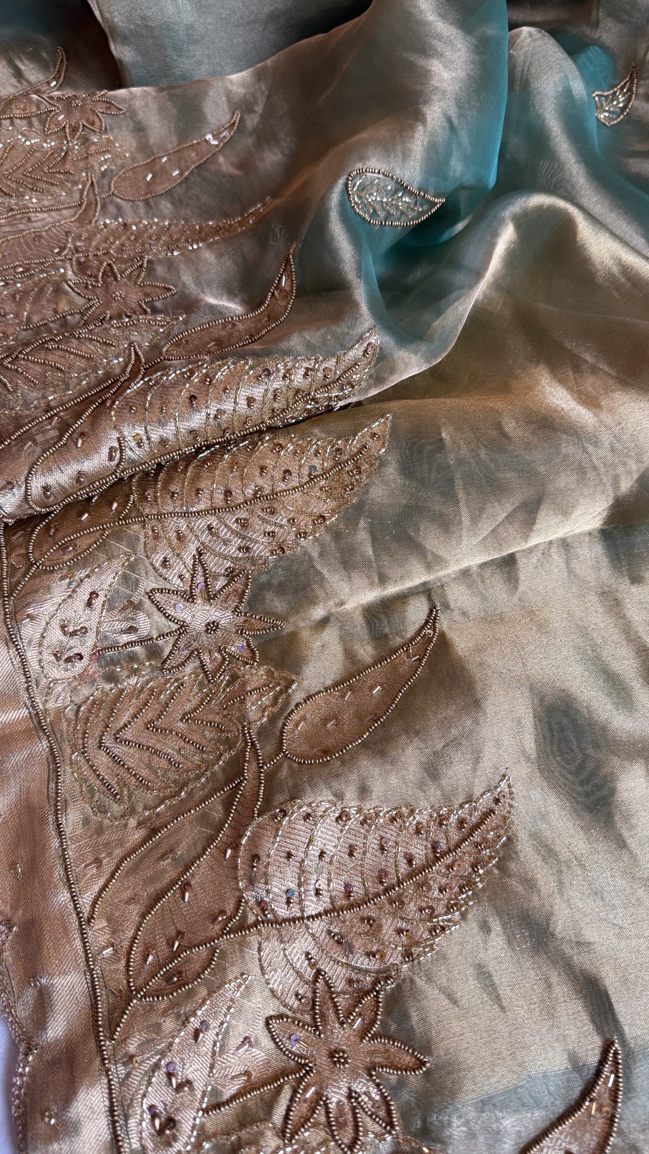 Husn candy green tissue silk heavy hand embroidered saree