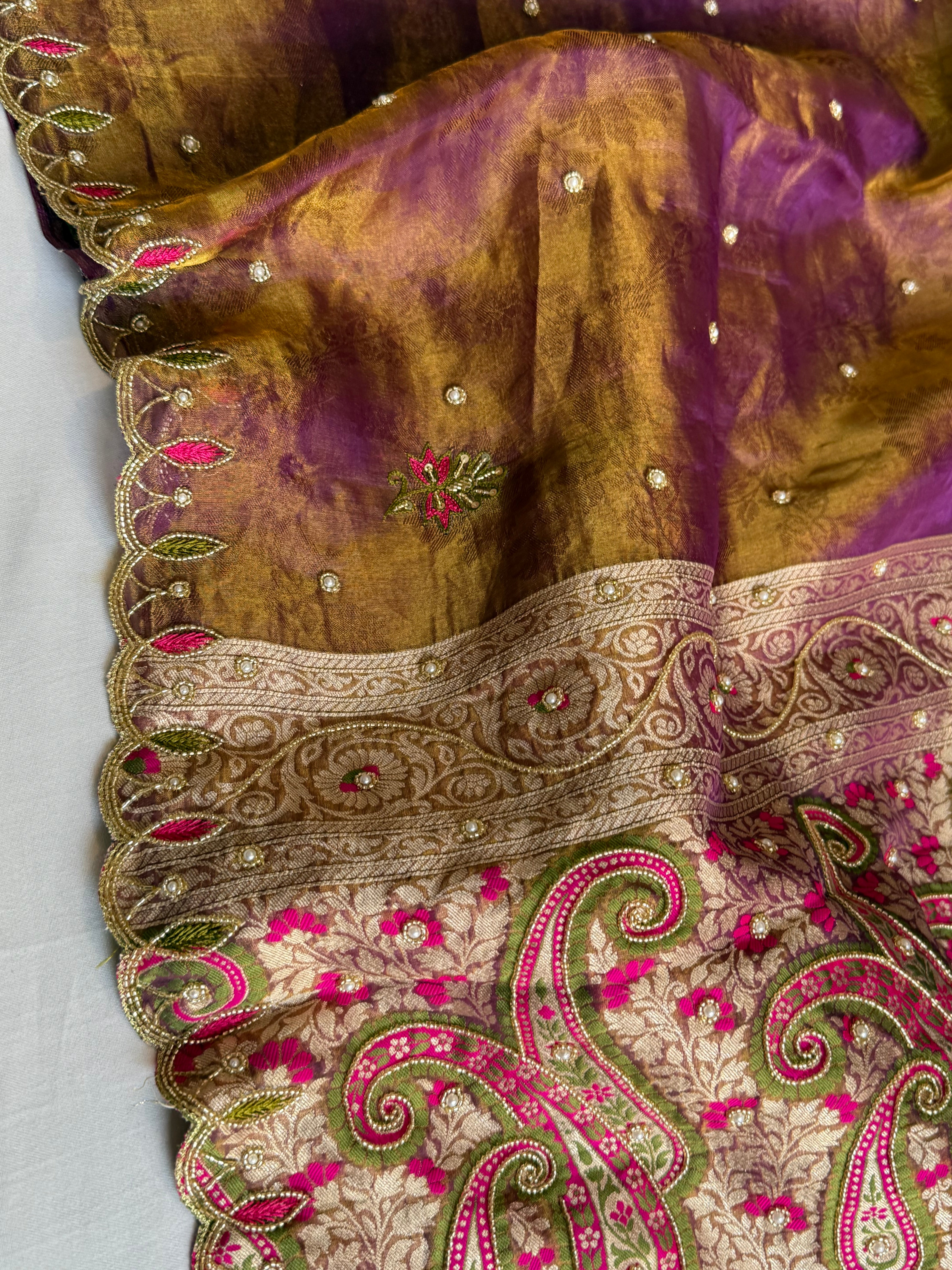 Copperish purple dhup chao effect tissue tanchoi jamevar meenakari pallu hand embroidered saree