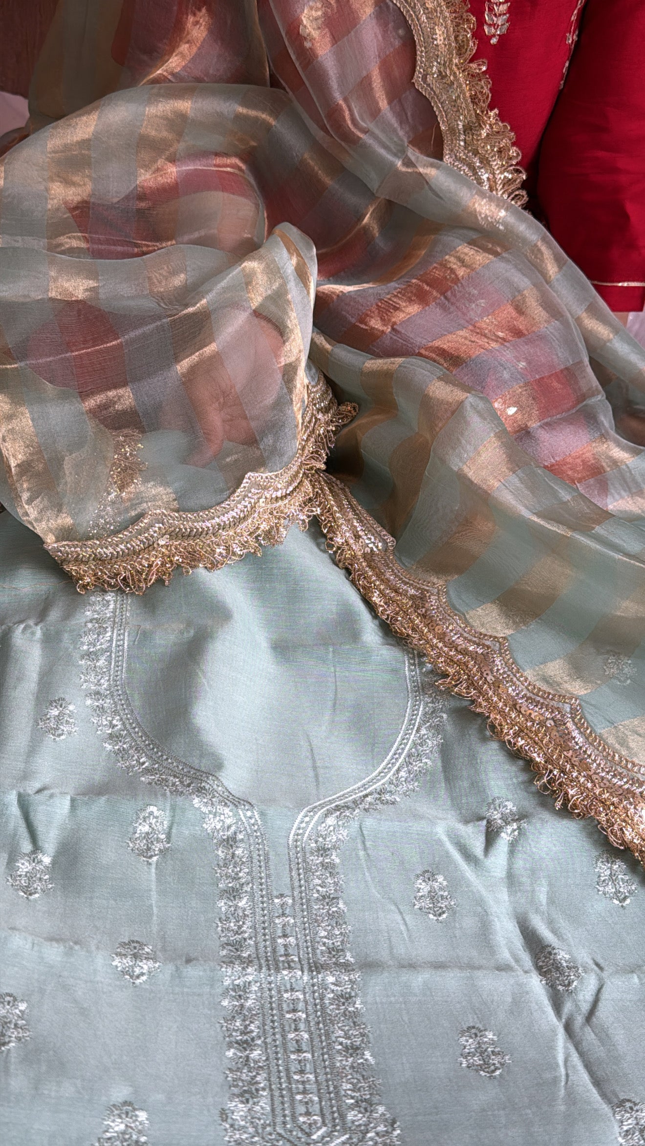 Banarasi cotton silk hand embroidered kurta paired with kora tissue striped duppata set