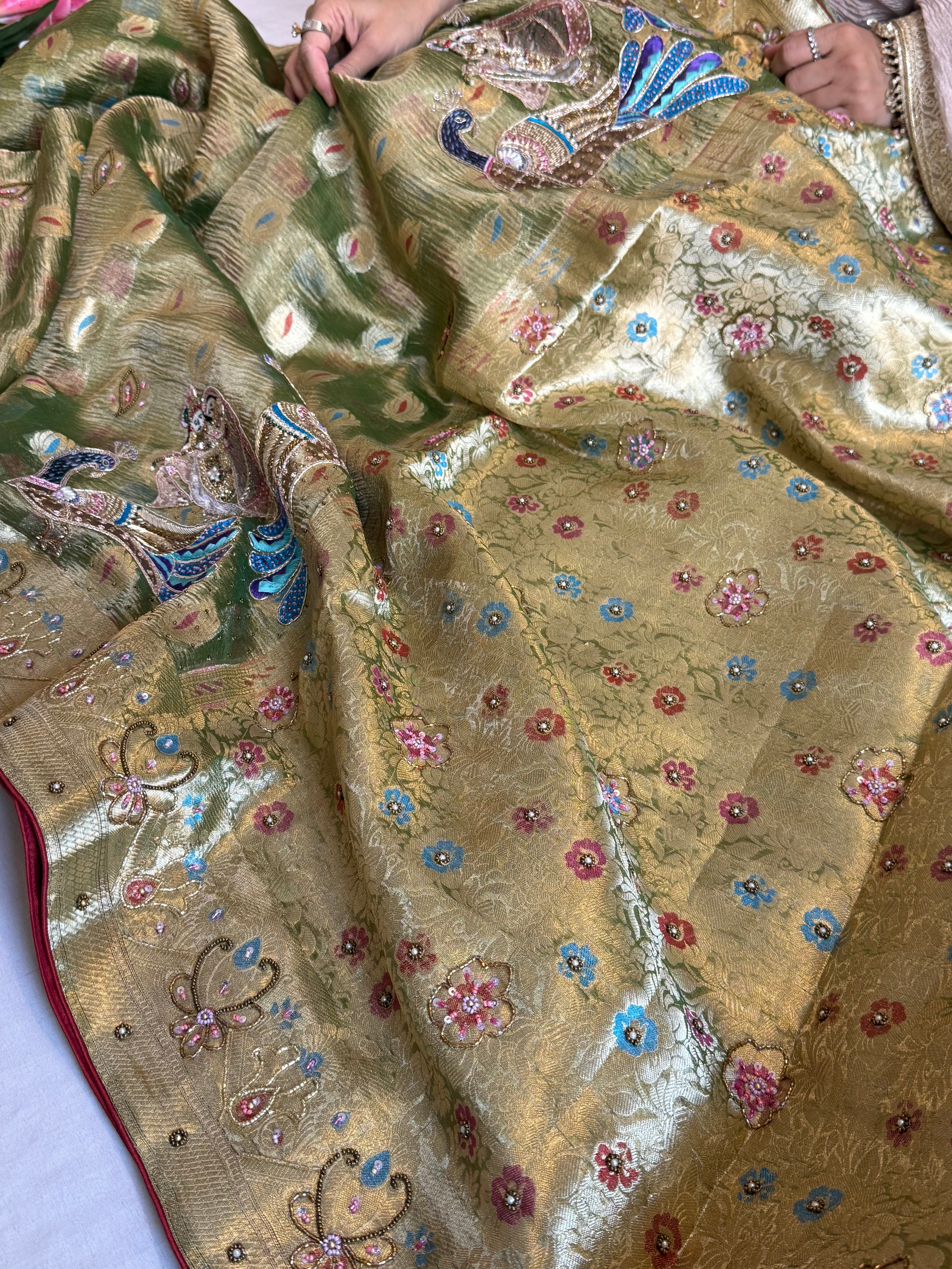 Mehendi green husn crushed tissue silk hand embroidered kadhwa saree