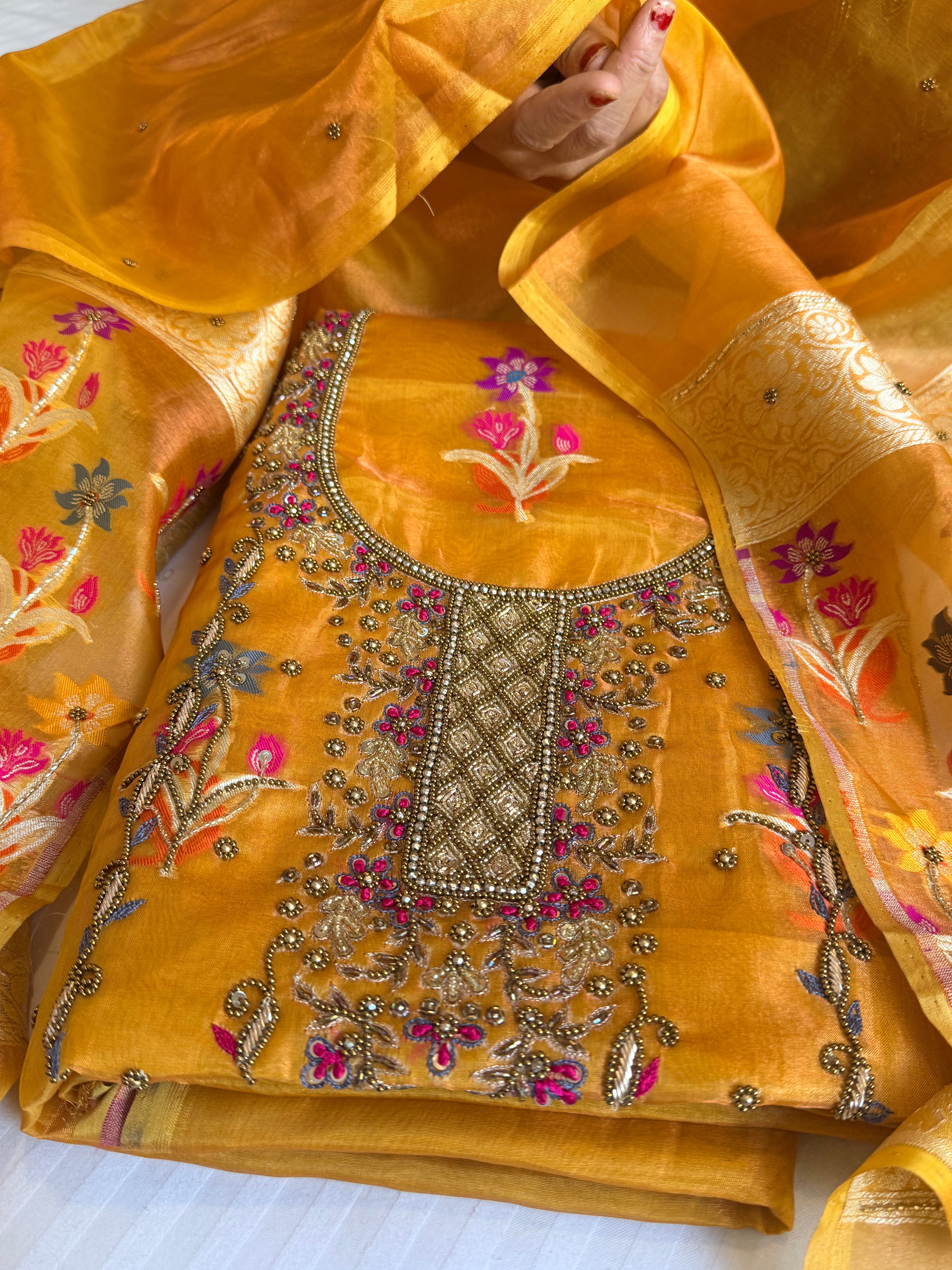 Banarasi tissue silk haldi gold tissue silk meenakari hand embroidered suit set