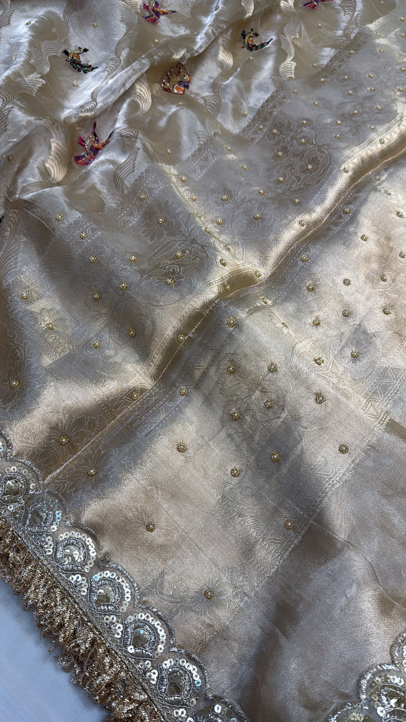 Champagne gold tissue silk jungla hand embroidered kadhwa saree