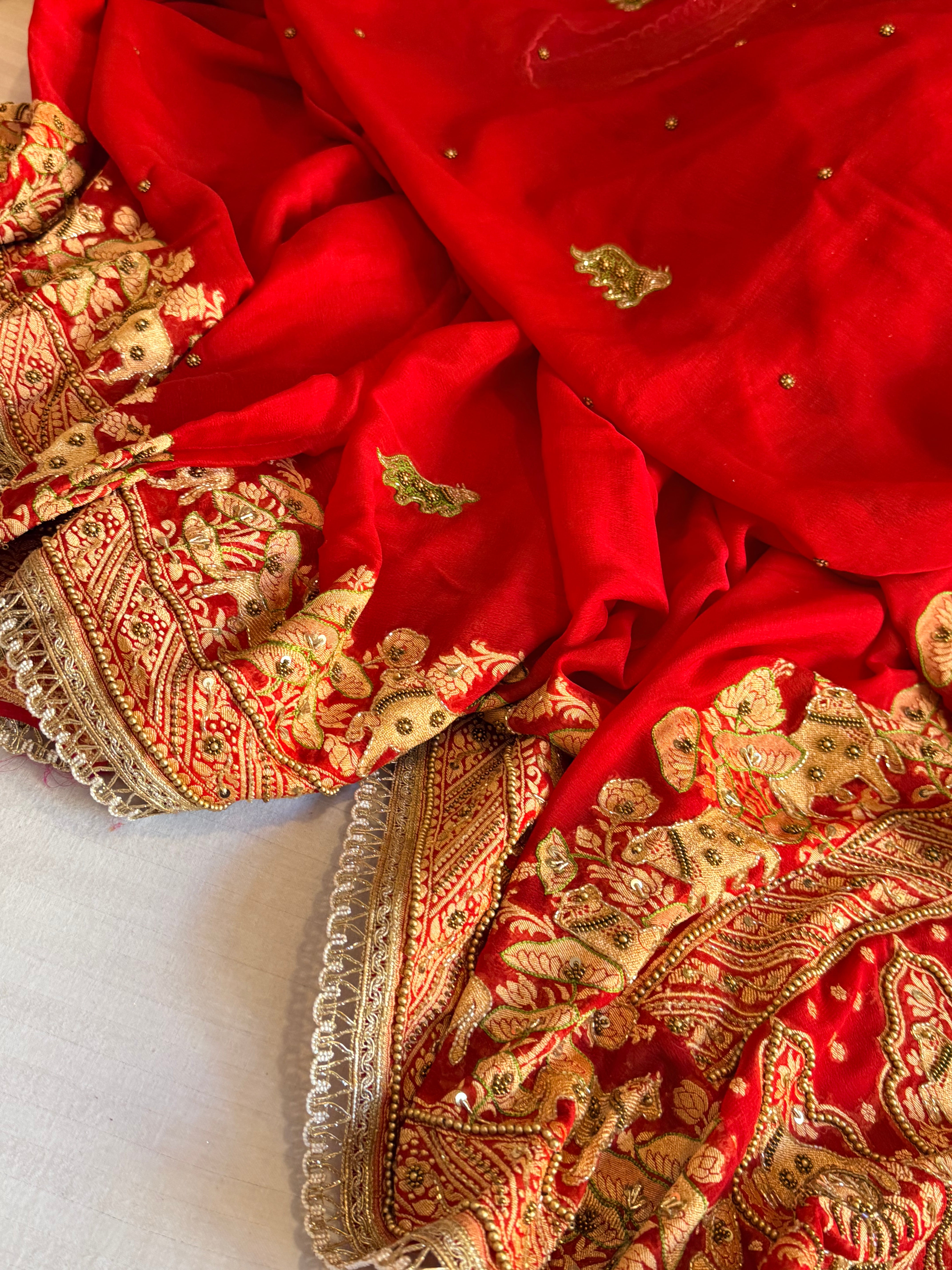 Banarasi chiffon gorgette deep red hand embroidered kadhwa saree