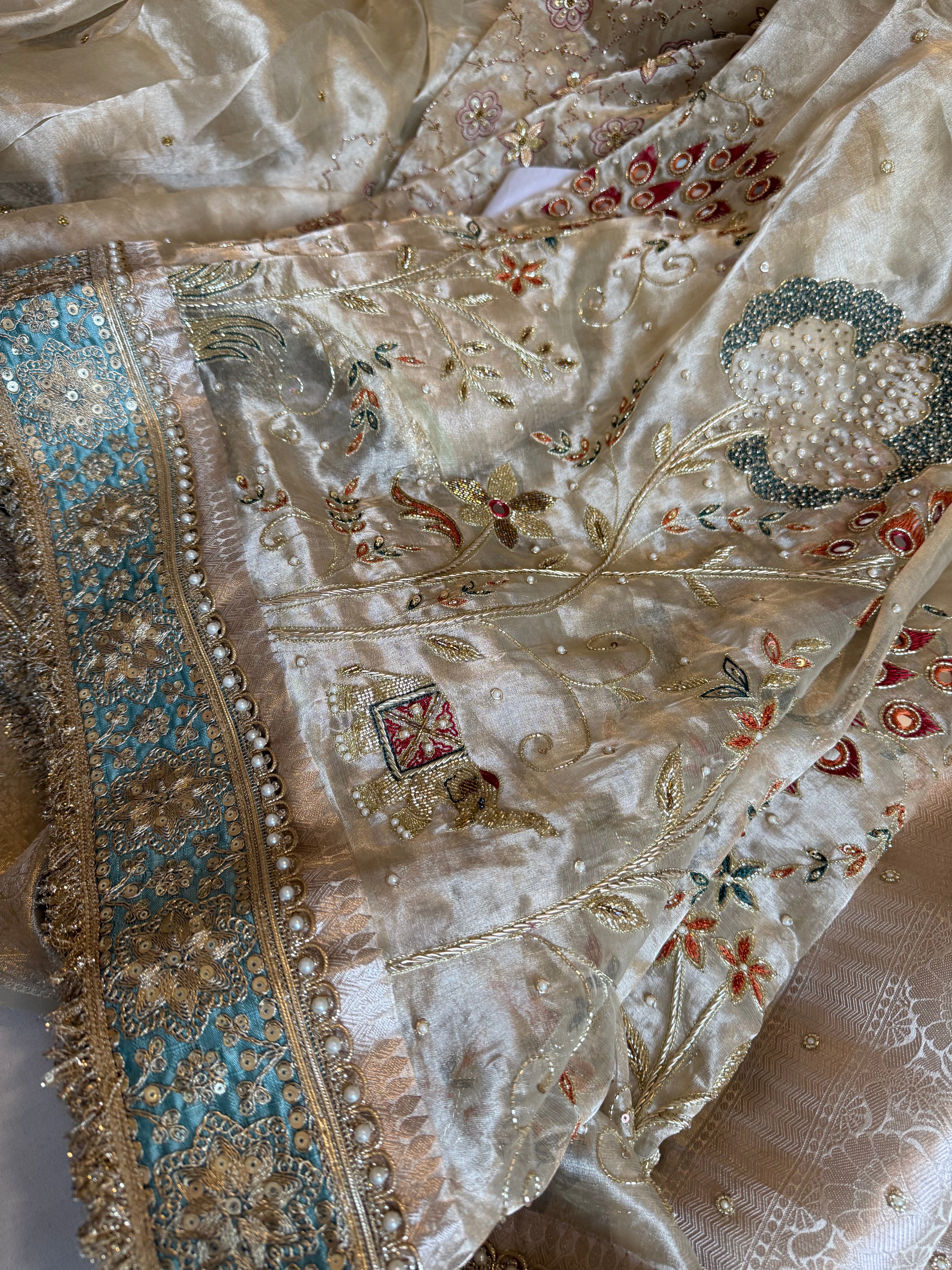 Kutchi inspired “sheesham edit” mirror work and meenakari hand embroidered saree