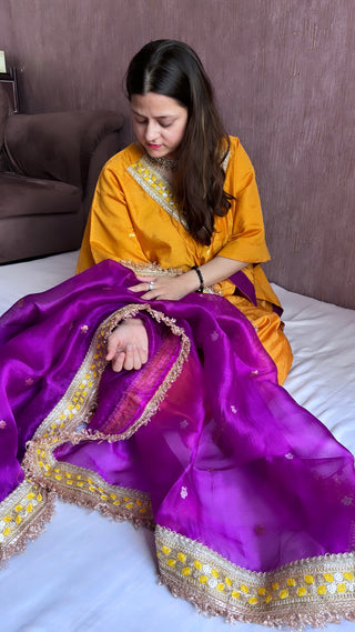 Haldi yellow-purple stitched hand embroidered kadhwa silk suit set from vyaah wala ghar edit