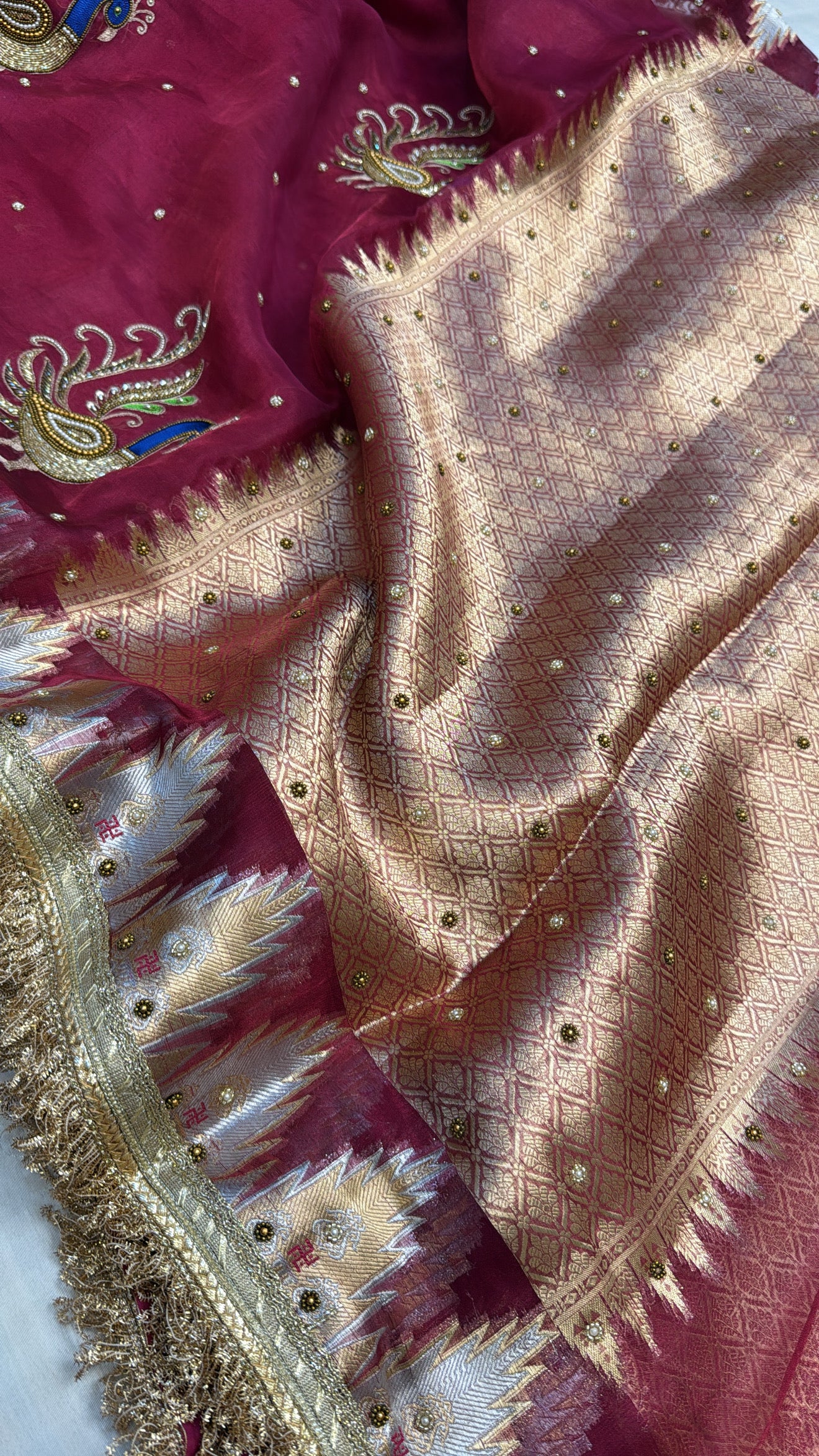 Cranberry red tissue silk kadhwa hand embroidered saree