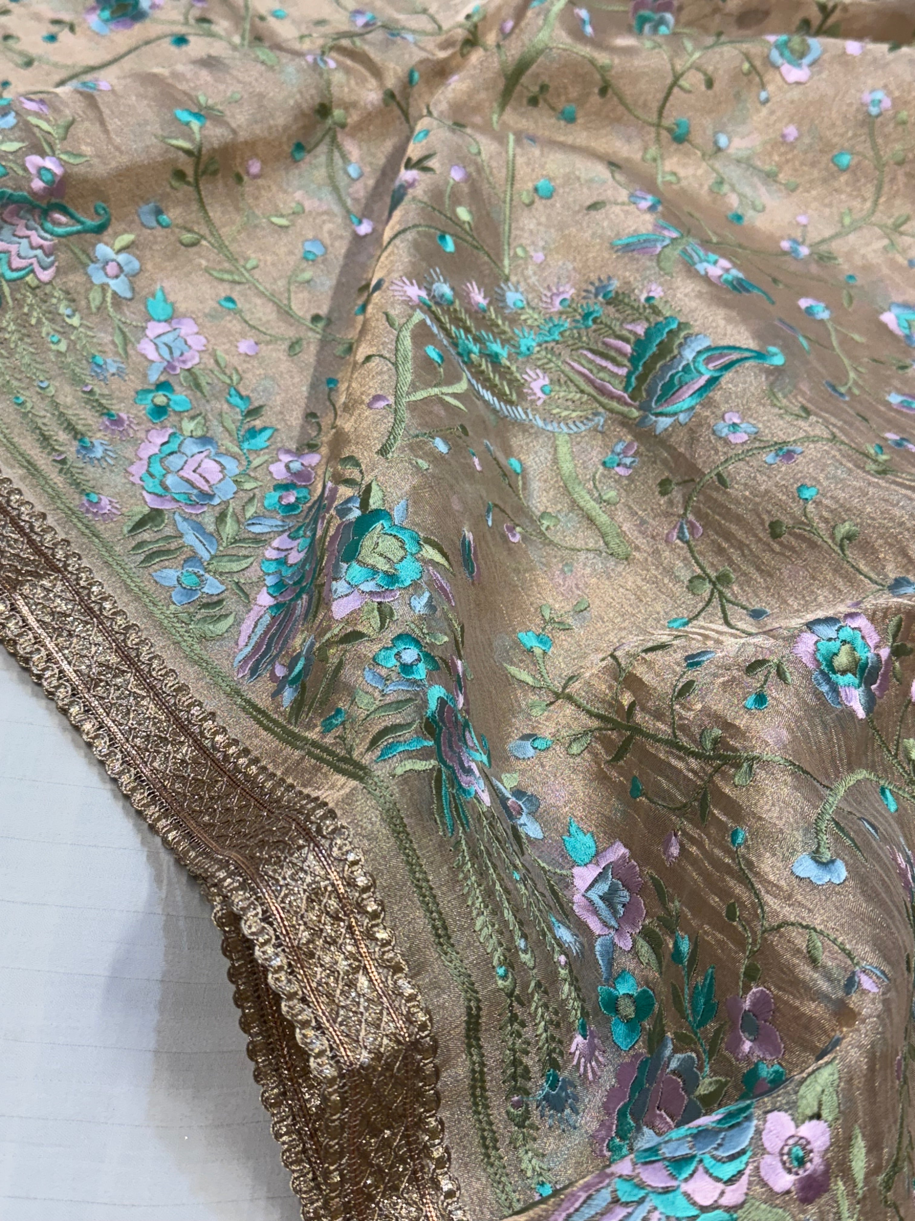 “Parsi gara” inspired tissue silk heavy resham work hand embroidered saree