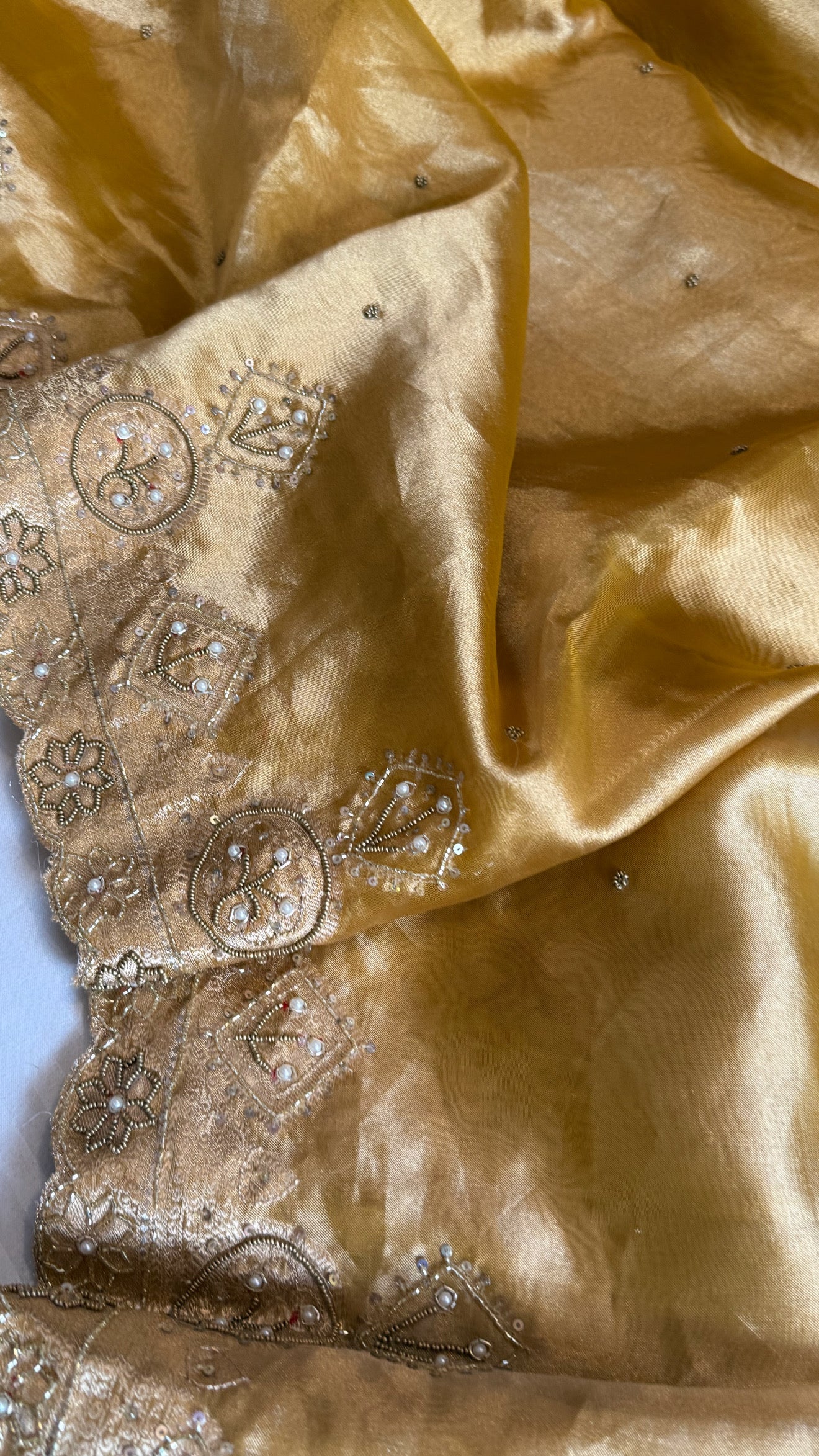 Husn golden yellow tissue silk heavy zardozi hand embroidered saree