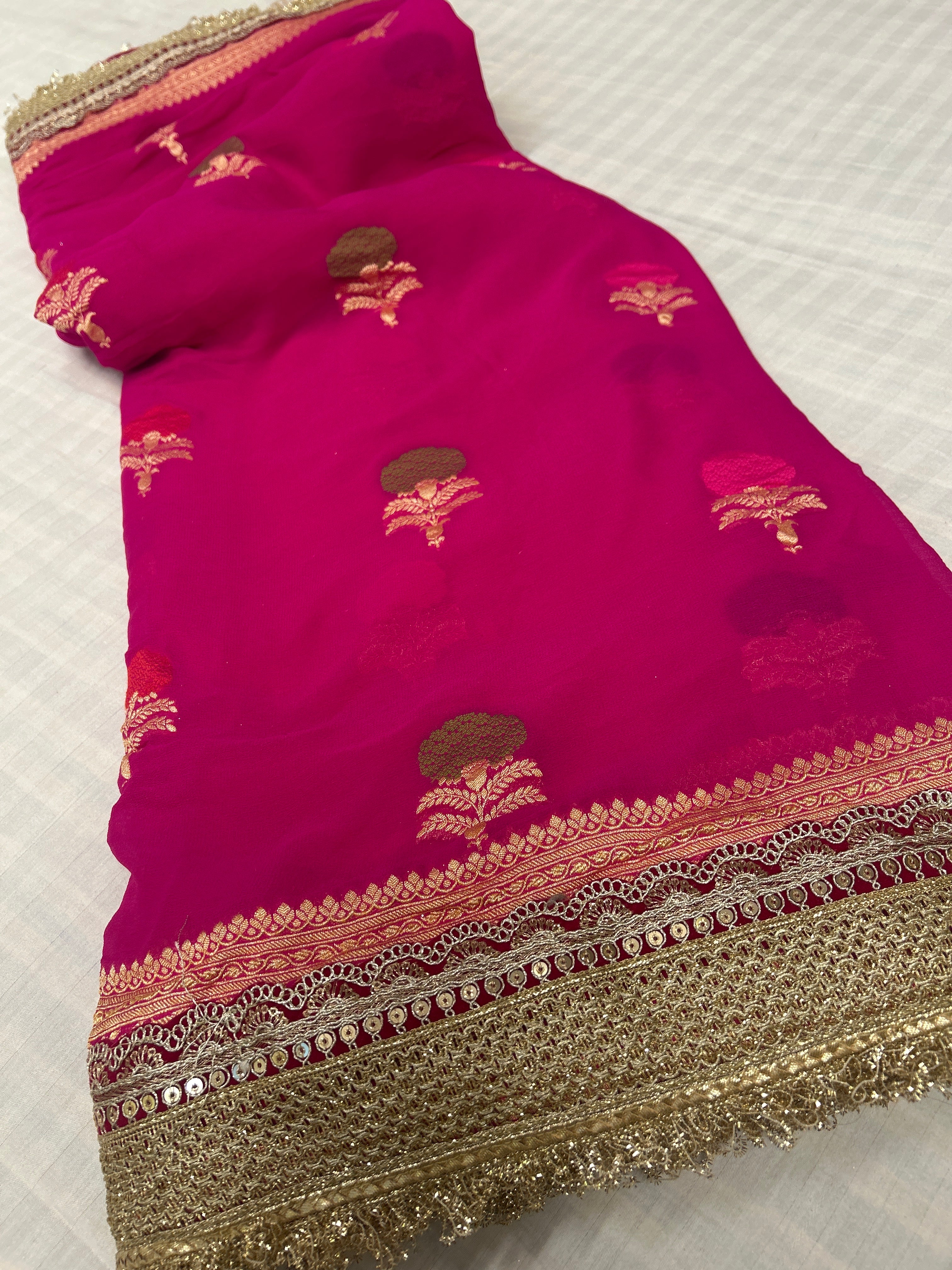 Hot pink meenakari buti georgette saree