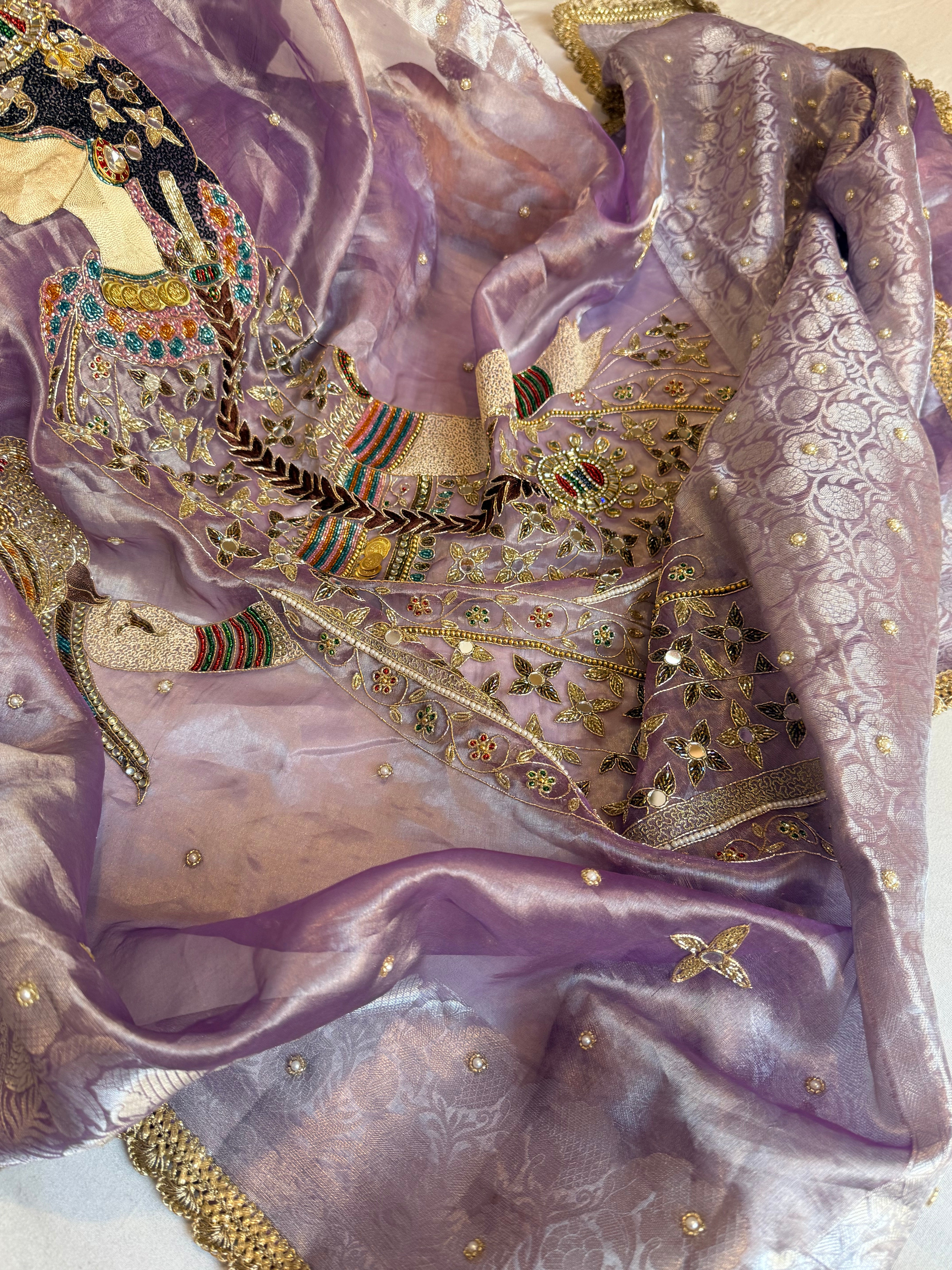 Heer saree with jadau necklace work hand embroidered tissue silk lilac saree