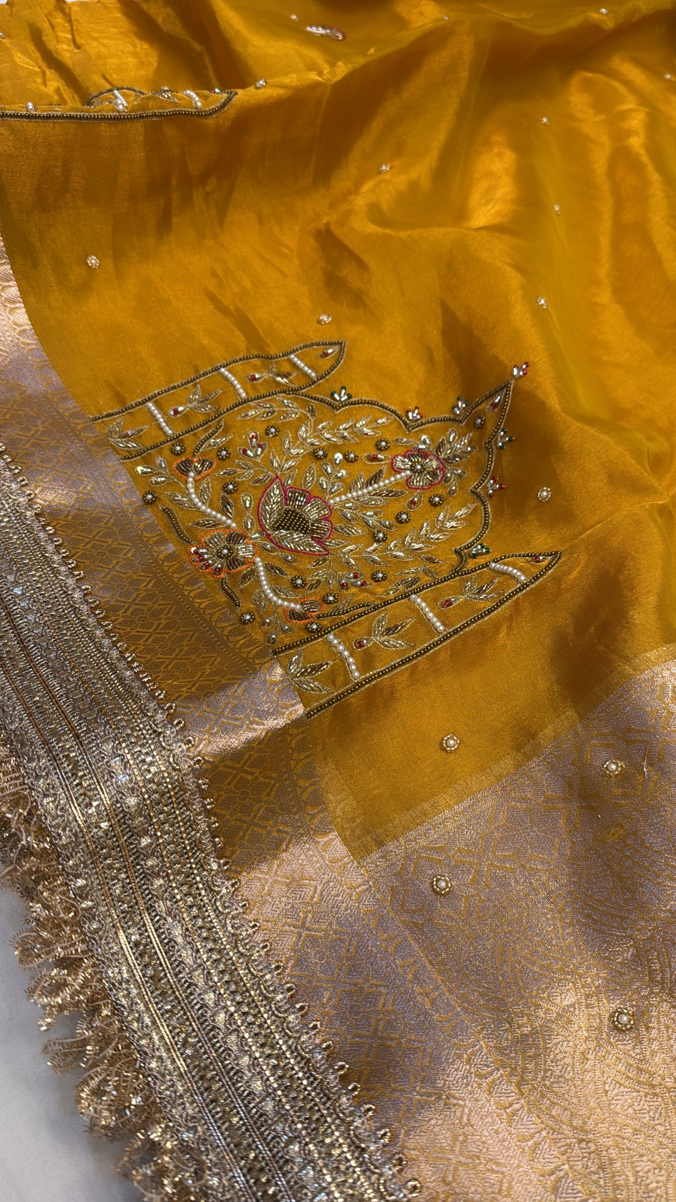 Haldi yellow husn tissue silk hand embroidered kadhwa saree