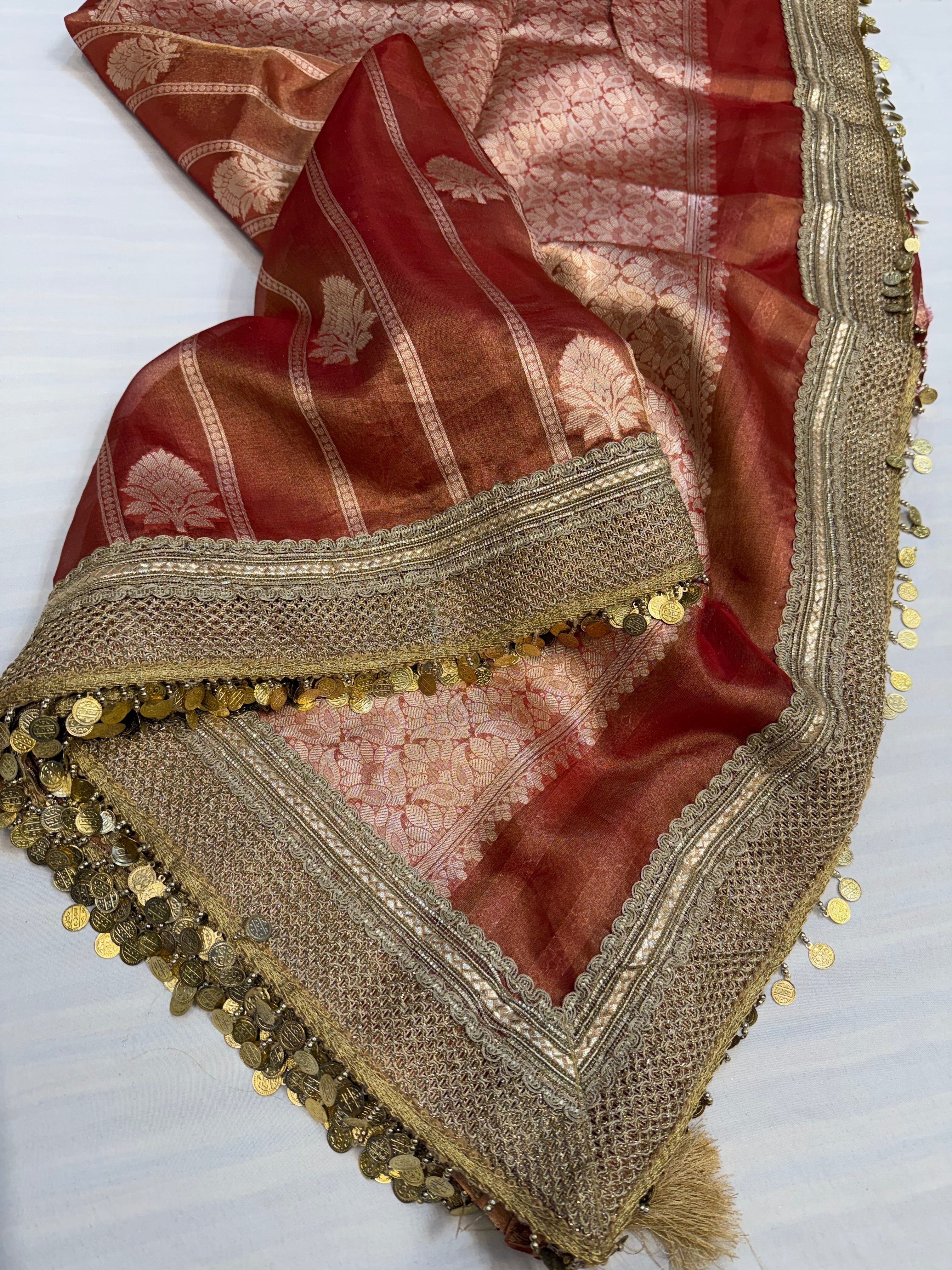Maroonish red maharani tissue silk kadhwa saree