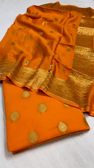 Bright mango gorgette kurta paired with moonga silk kadhwa duppata suit set