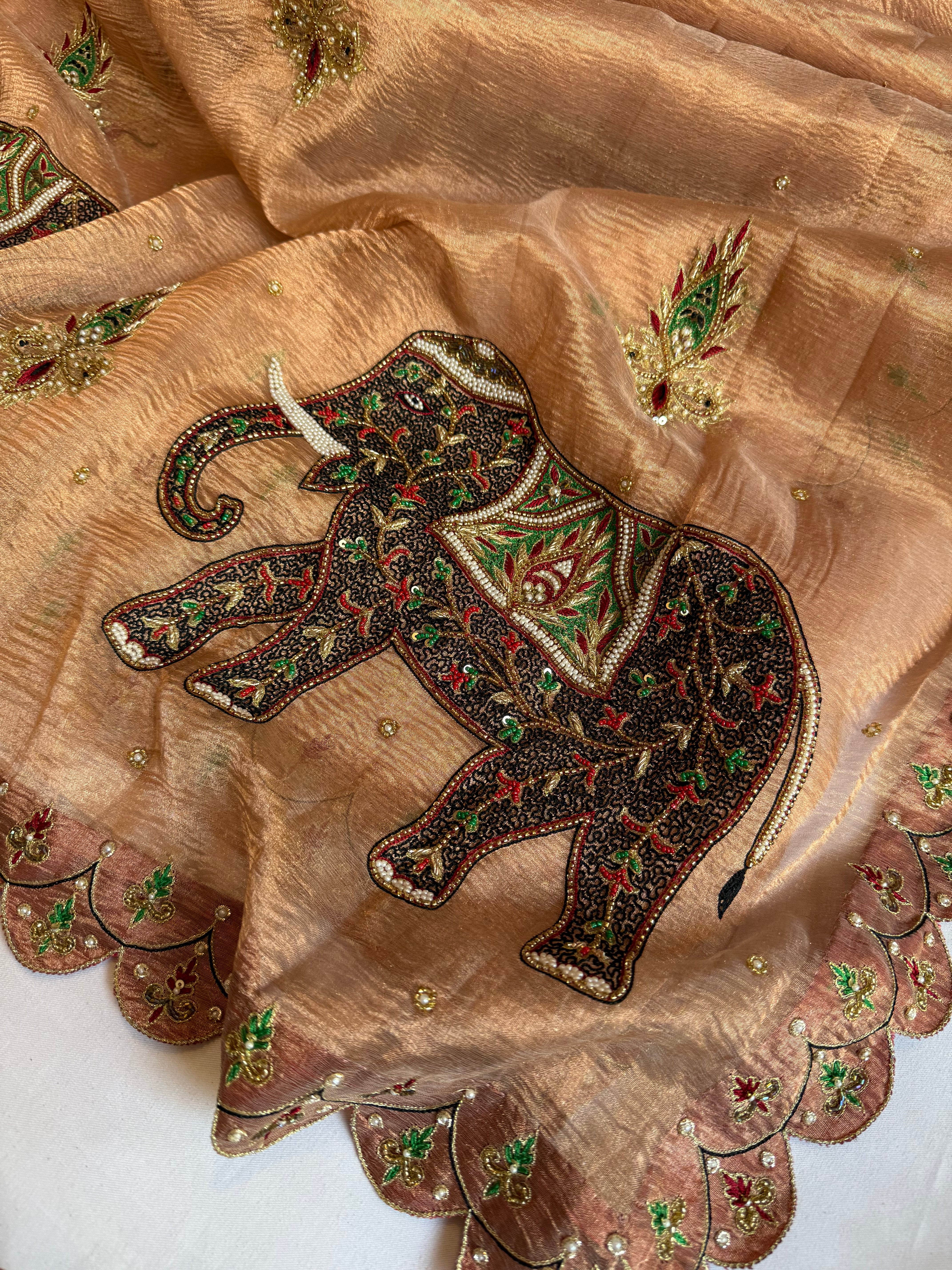 GajGamini copper crushed tissue silk elephant motif heavy hand embroidered saree