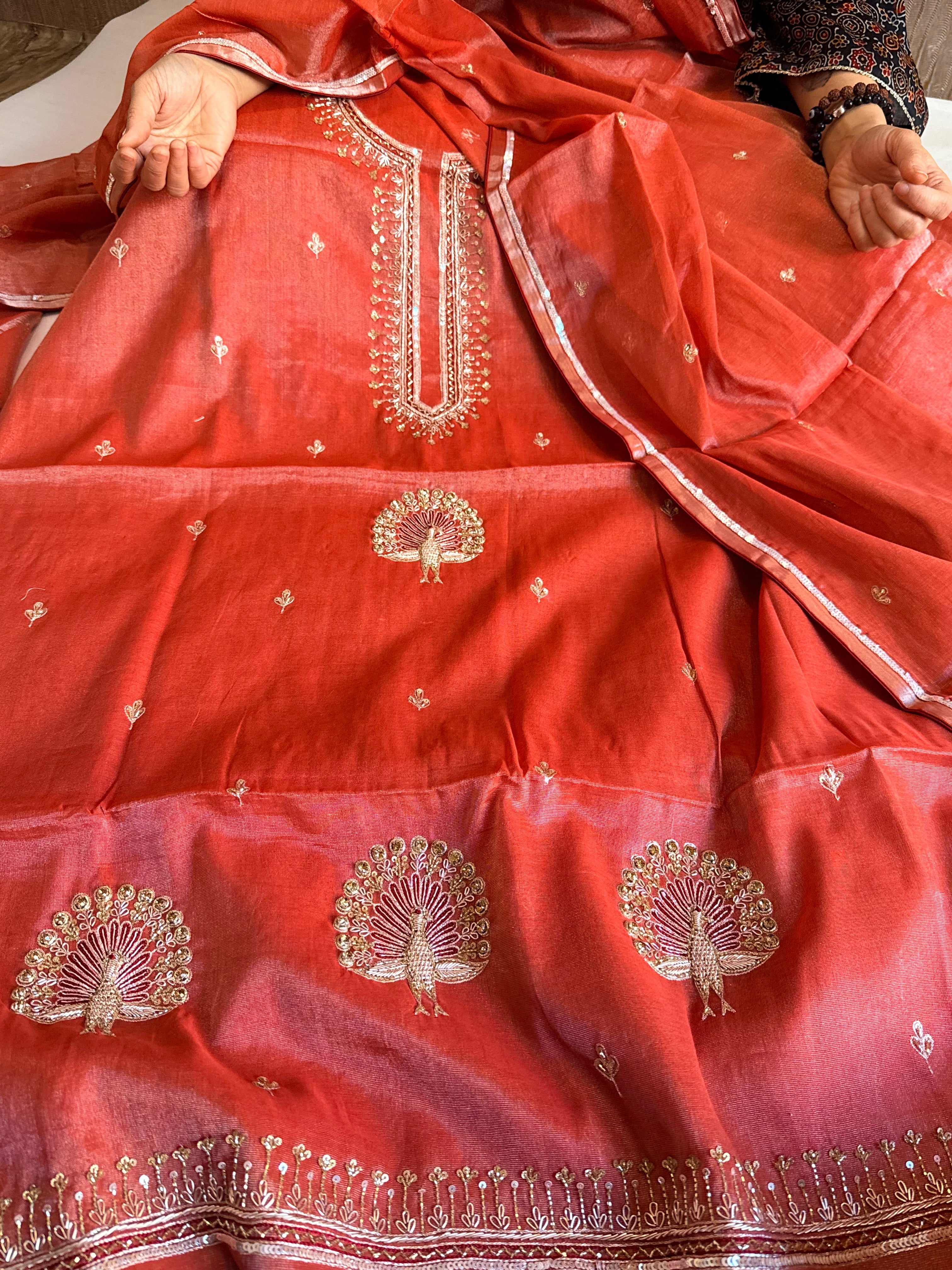 Reddish-orange mul tissue silk hand embroidered kadhwa suit set