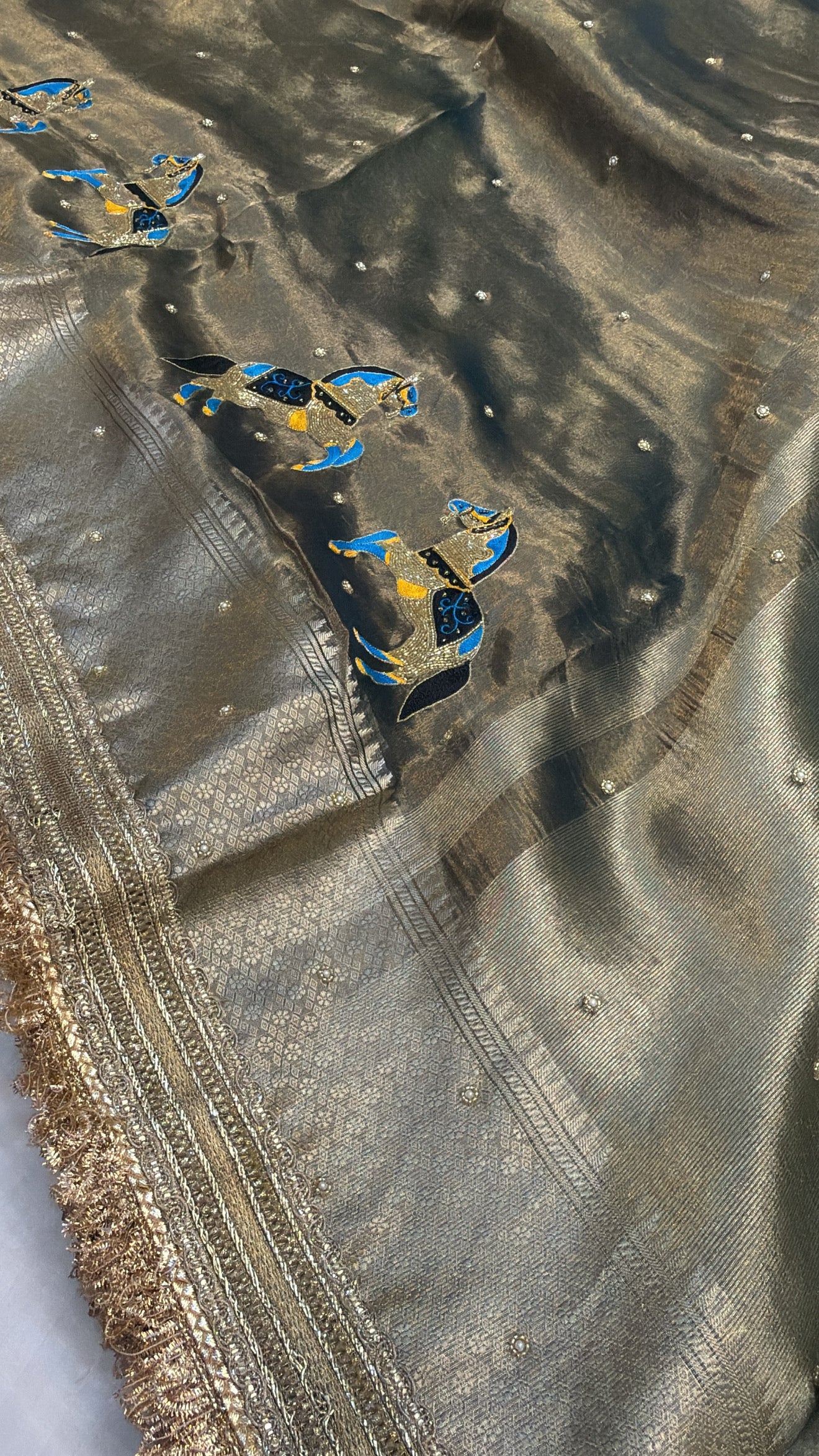 Molten charcoal gold tissue silk horse motif hand embroidered kadhwa saree