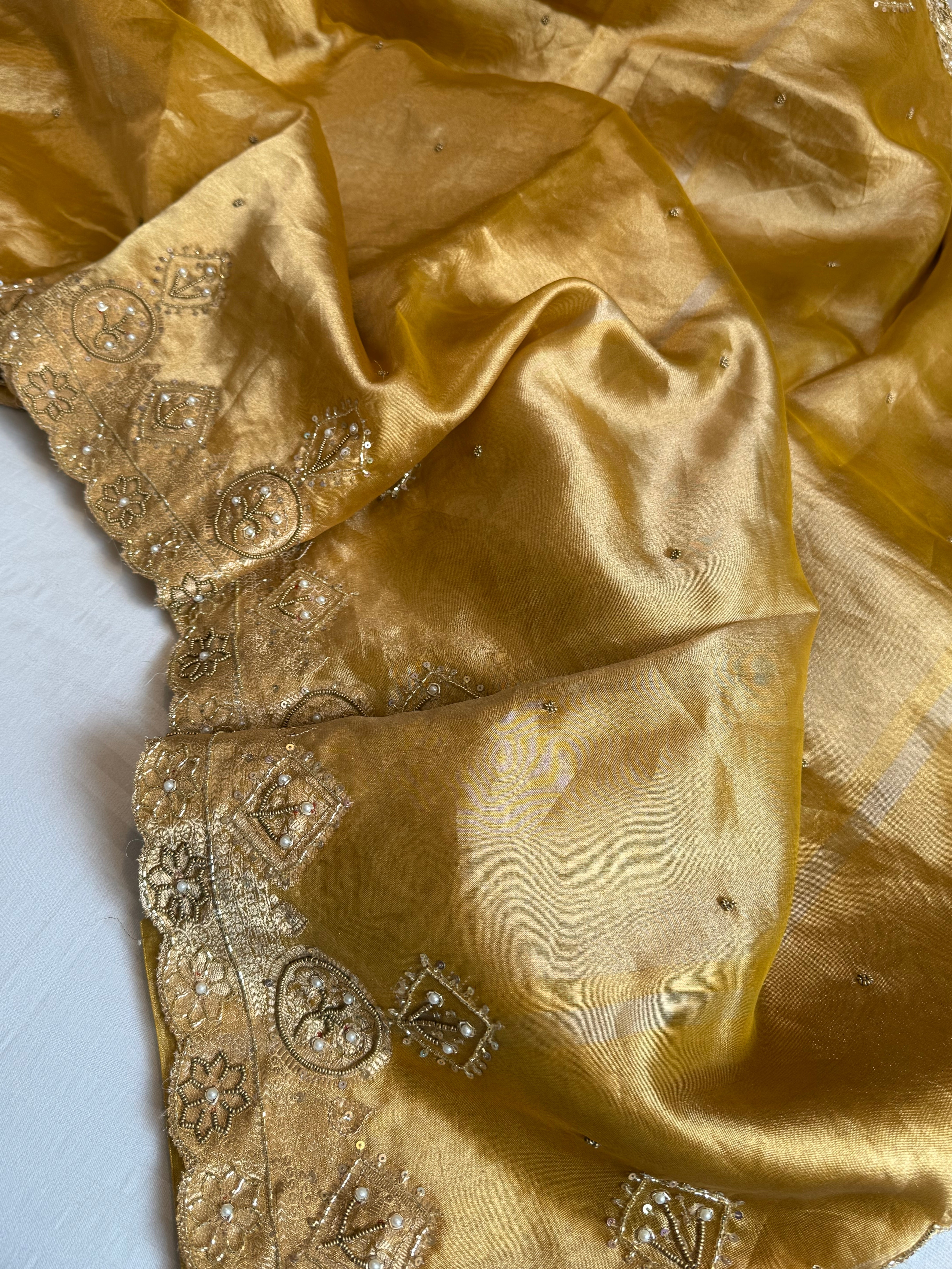 Husn golden yellow tissue silk heavy zardozi hand embroidered saree