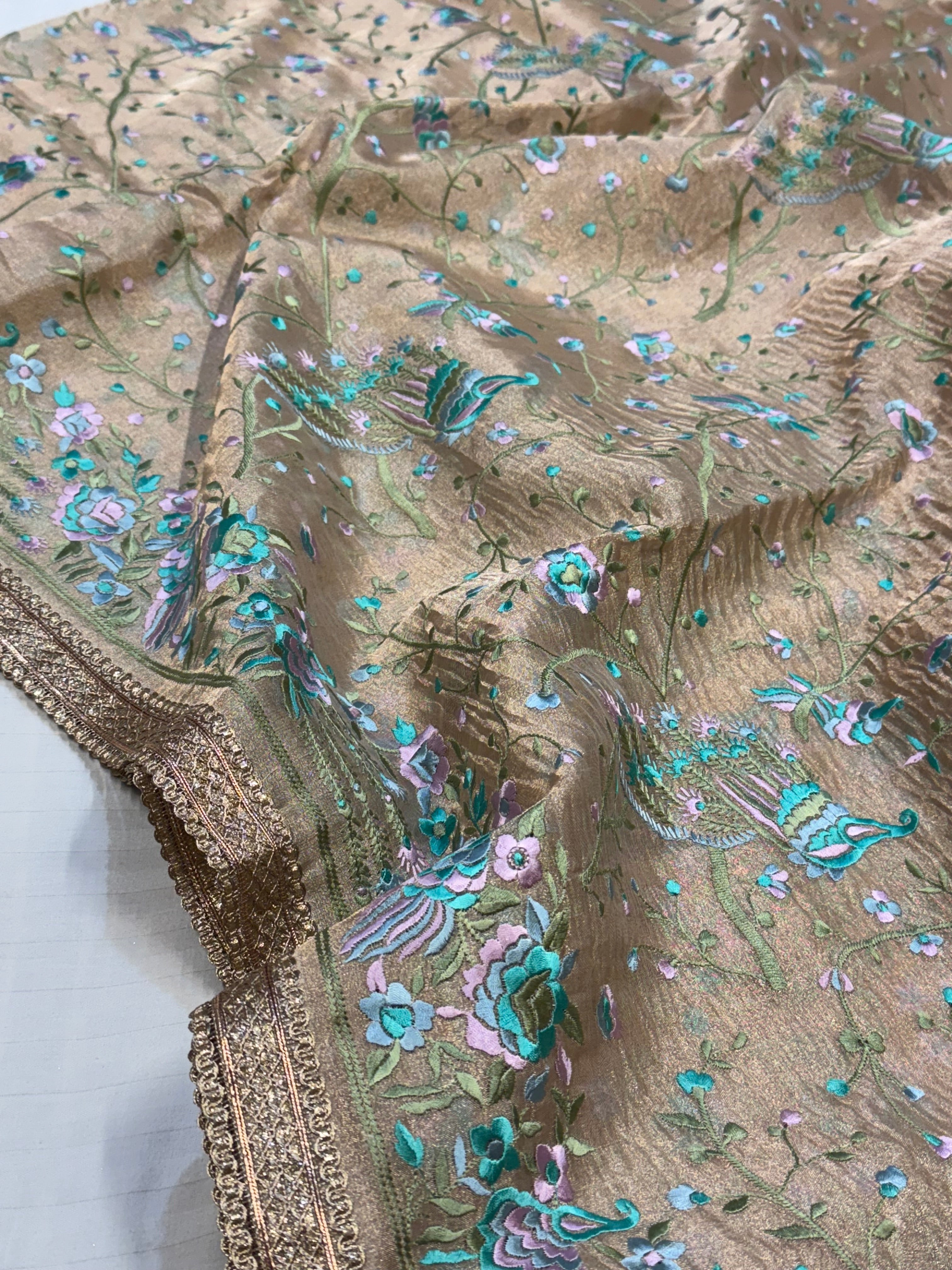 “Parsi gara” inspired tissue silk heavy resham work hand embroidered saree