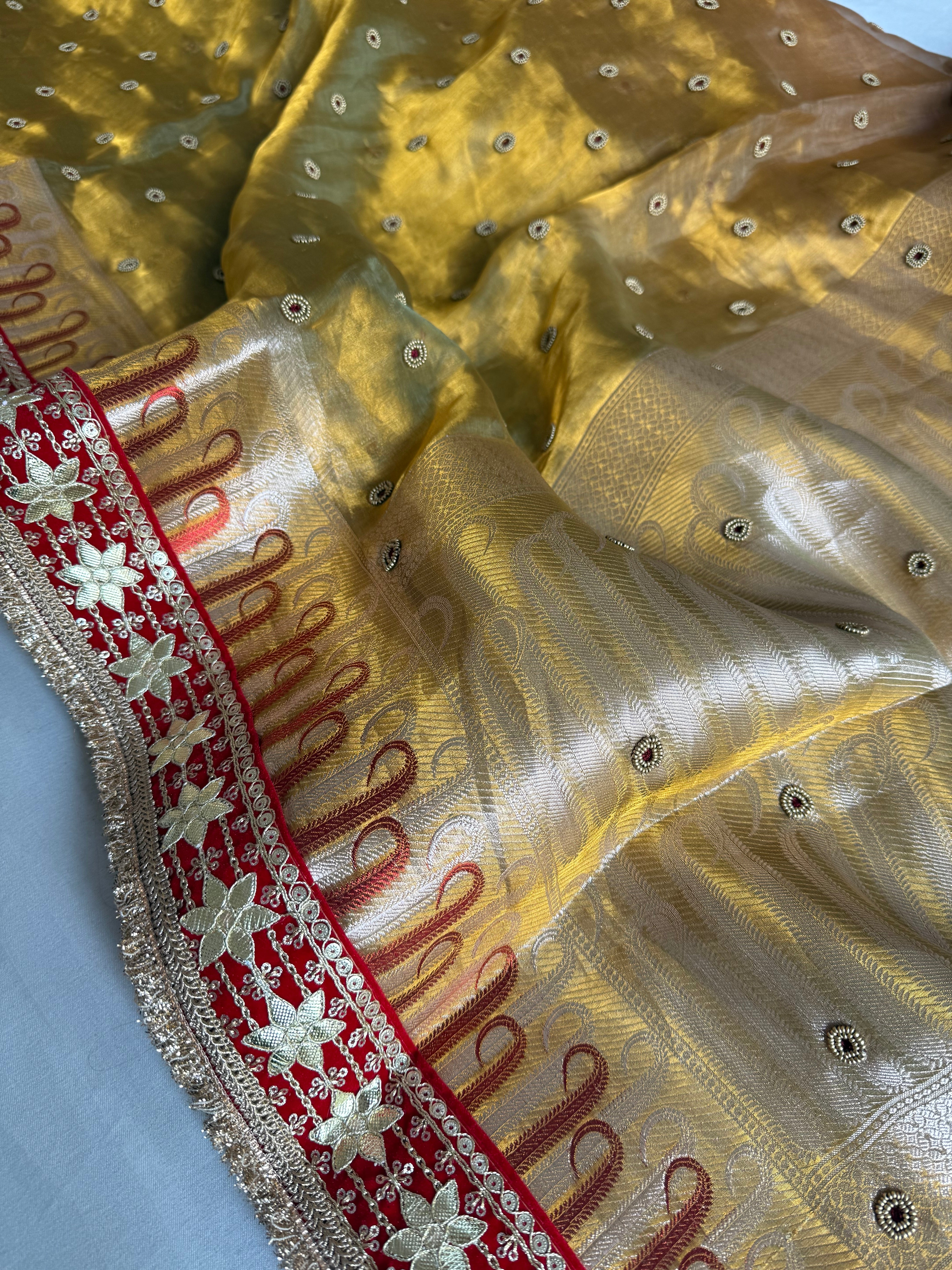 Kanjivaram gold tissue silk red meenakari hand embroidered kadhwa saree