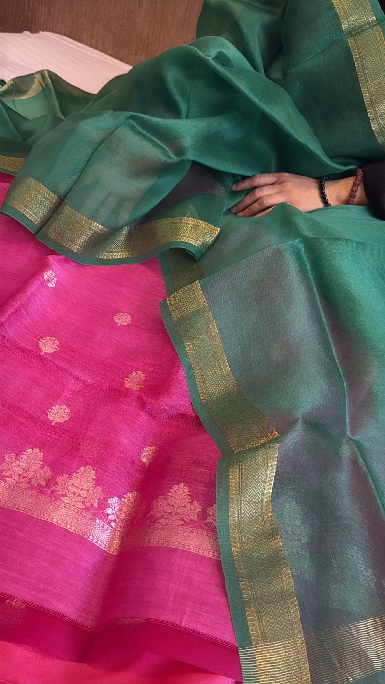 Rani pink linen gorgette kurta paired with green contrast kora silk duppata set