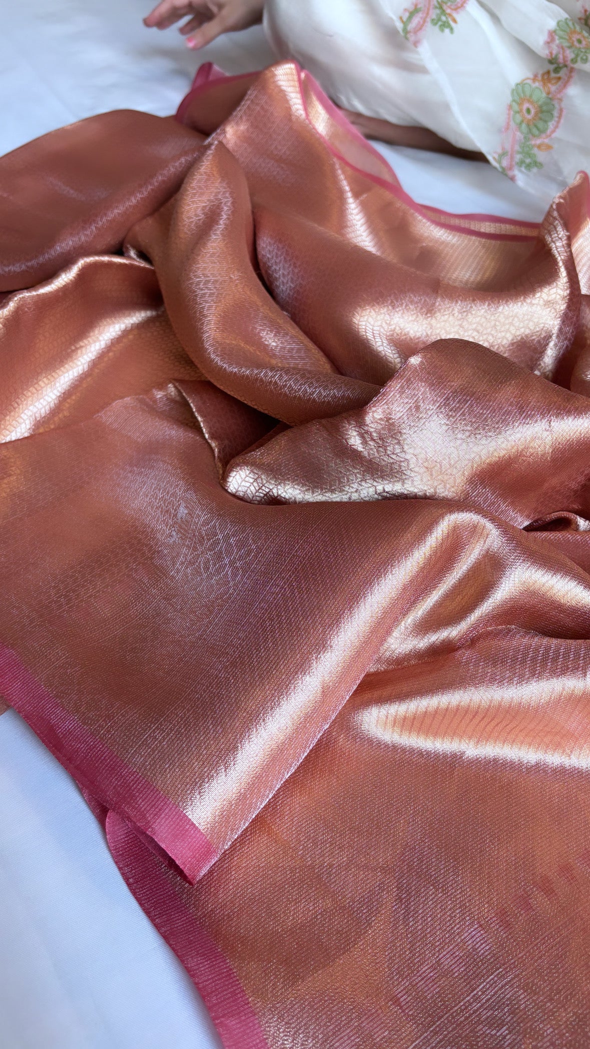 Pinkish-orange dhup-chao effect tissue brocade kadhwa saree